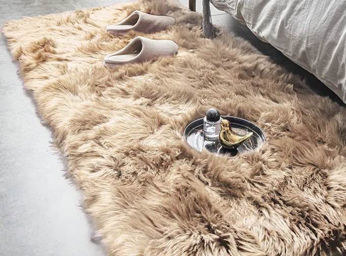 malaiah shag faux sheepskin fur area rug in beige