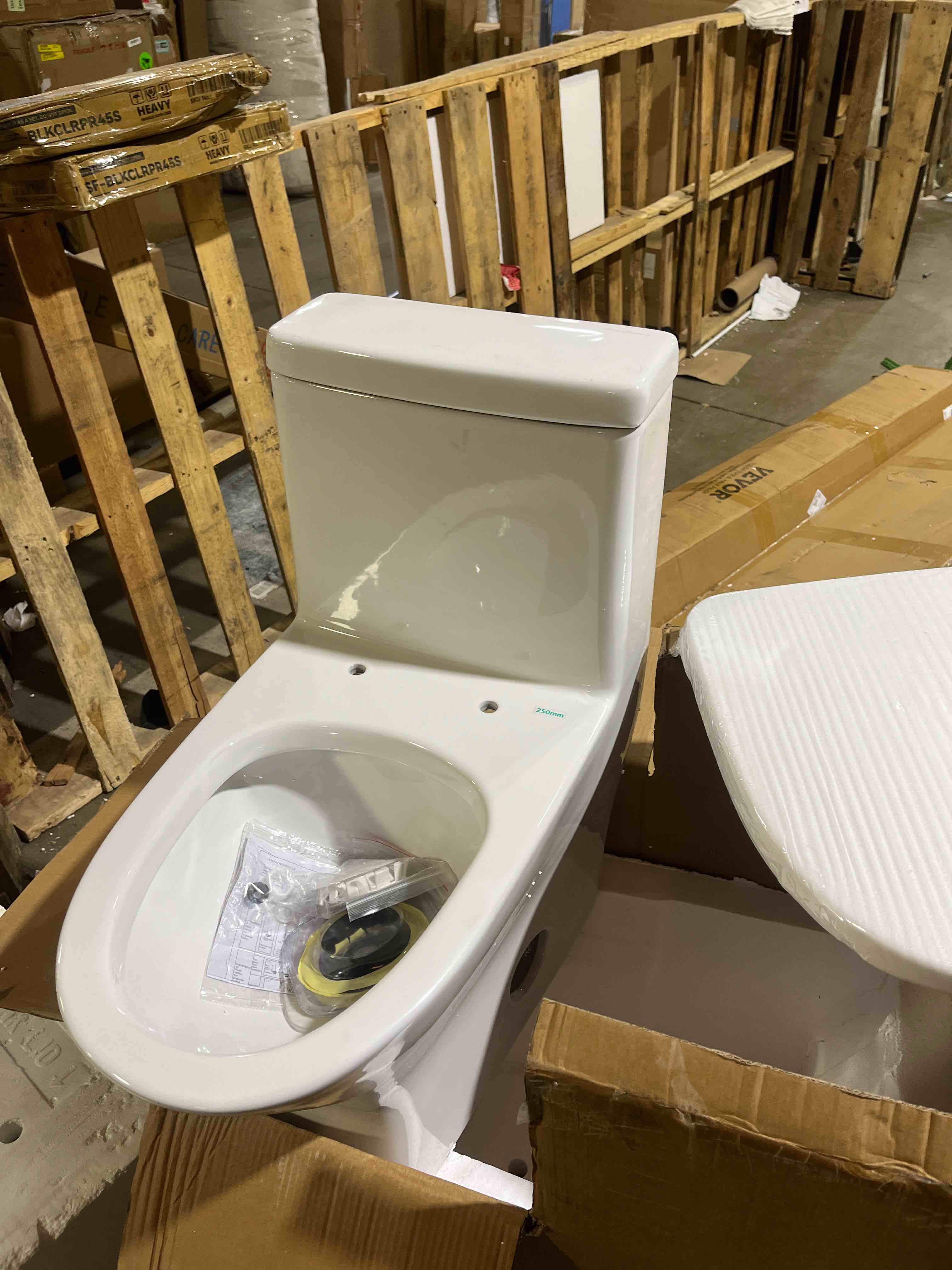 Condition photo showing New/Like New for Sublime II One-Piece Round Toilet with Left Side Flush  10” Rough-In 1.28 gpf