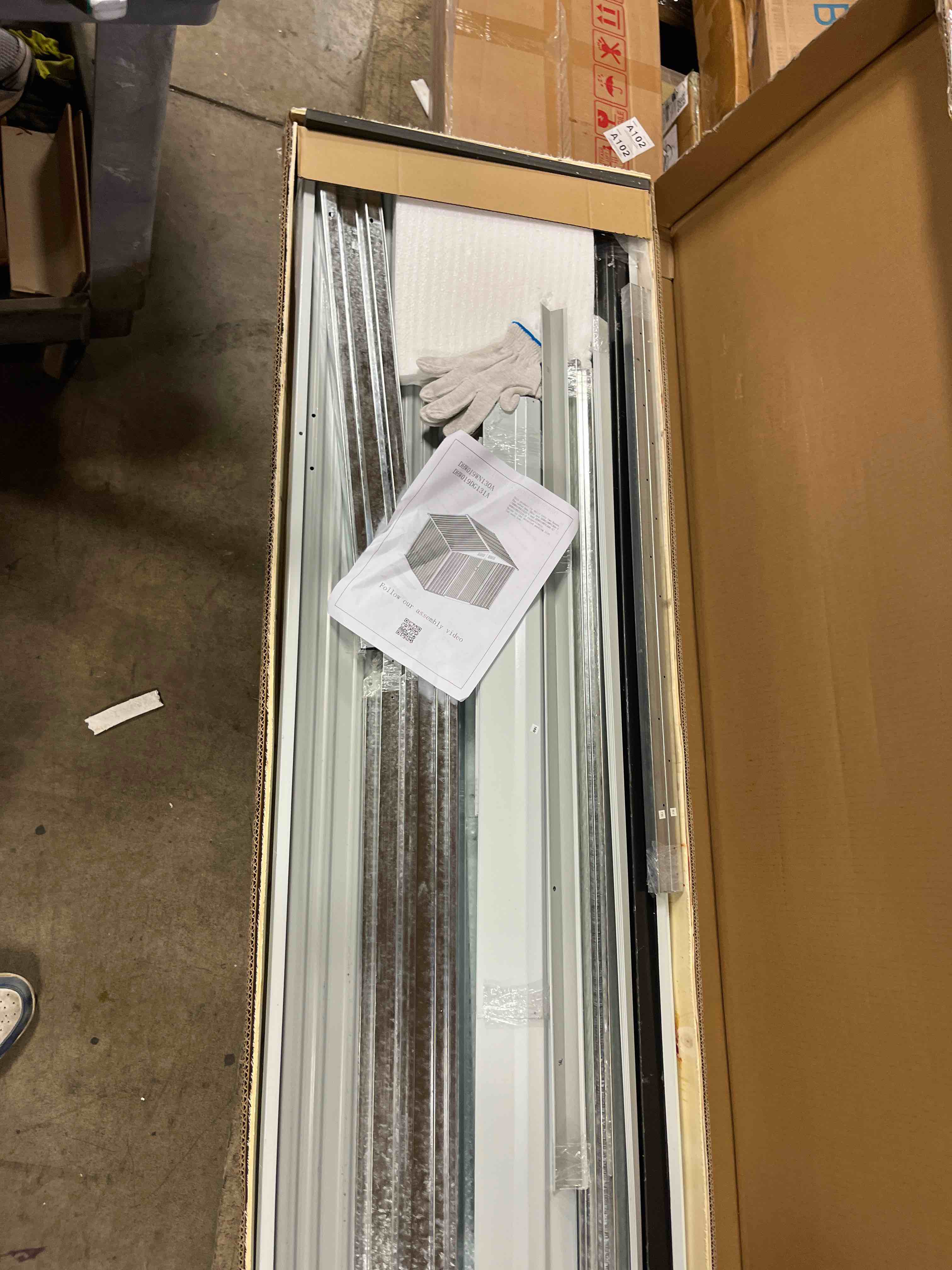 Condition photo showing Good Condition for 10x10ft outdoor metal storage shed, lockable weatherproof garden shed for tools & equipment, durable galvanized steel with sloping roof & ventilation, ideal for backyard, patio & garage storage, grey, incomplete box 1 of 2 only! 