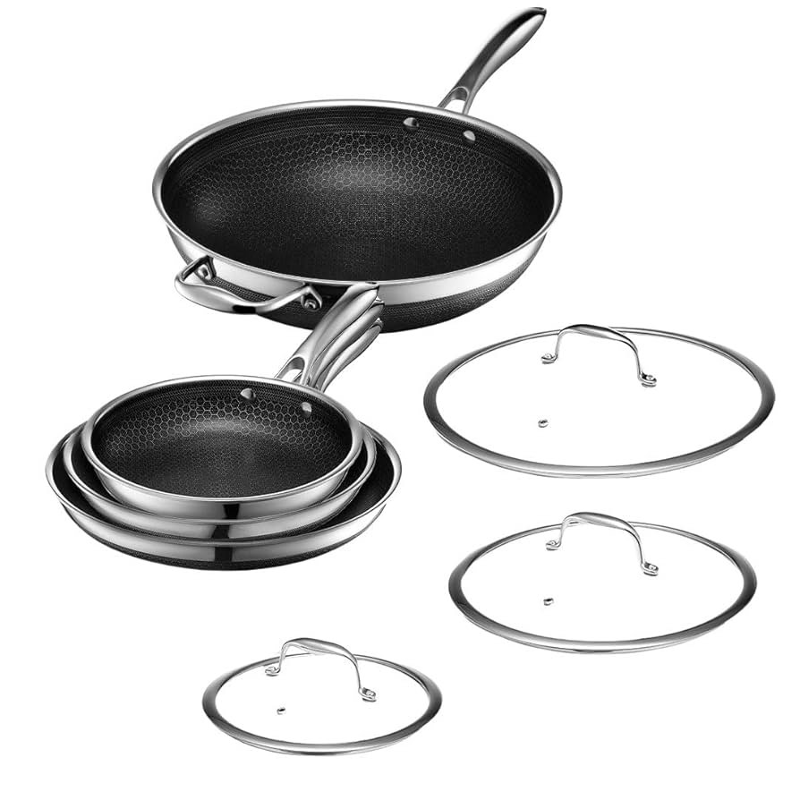 Hexclad Commercial 7 Piece Cookware Pan Set- 8” Fry Pan with Lid, 10” Fry Pan with Lid, 12” Fry Pan with Lid, 12” Wok  Hybrid  Nonstick Tri-Ply  Stainless Steel. Patented Hybrid Non-stick Technology, Compatible With Gas, Induction, Electric and Ceramic Cooktops, Oven-safe up to 500°F, Lids up to 400°F, Dishwasher-friendly