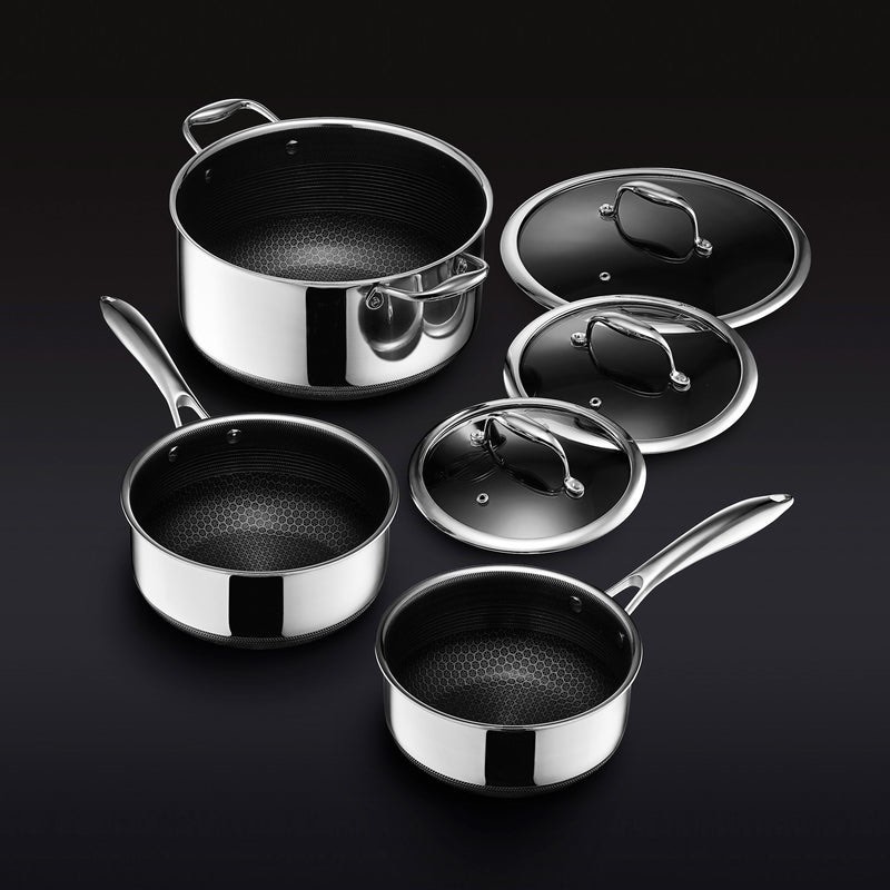 HexClad Cookware Set, 2 Qt Pot with Lid, 3 Qt Pot with Lid, 8 Qt Pot with Lid, Hybrid technology combining stainless steel and TerraBond™ ceramic nonstick, Dishwasher, Oven, and Metal Utensil Safe. 