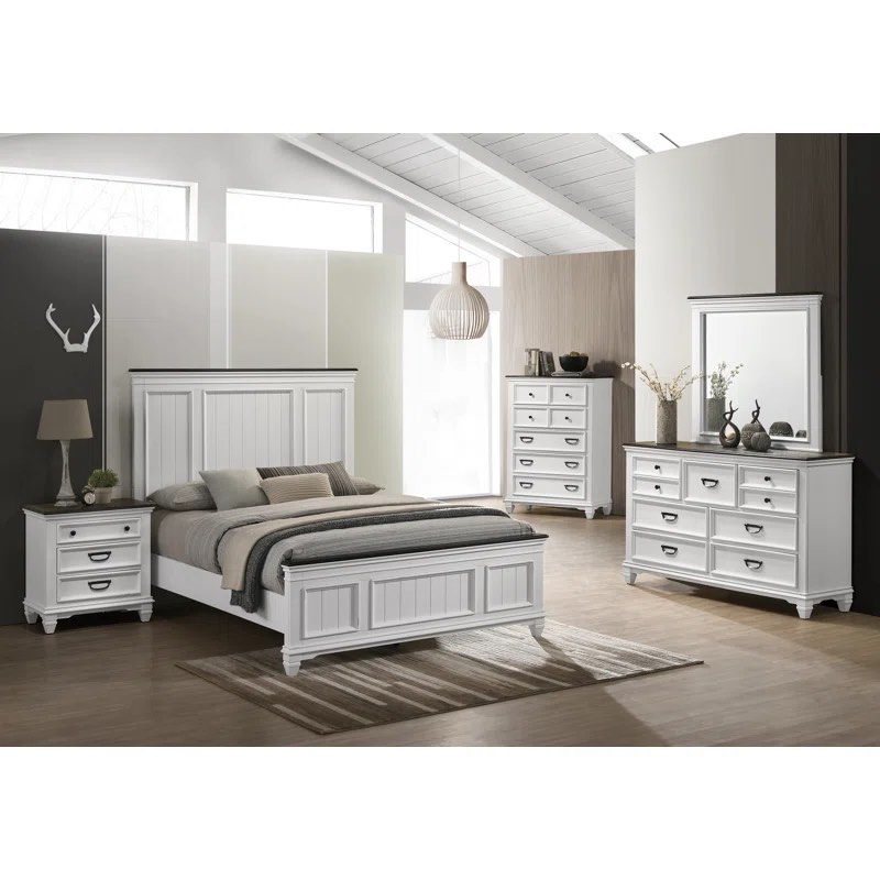 Semaj Rustic Style Bedroom Furniture Set, Lightly Distressed White with Deep Brown Tops and Iron Handles. 9 Drawer Dresser with Mirror, 2 Triple Drawer Nightstands, and 7 Drawer Chest. Minor scratch on mirror, top of nightstand, and small crack on bottom chest edge otherwise great condition