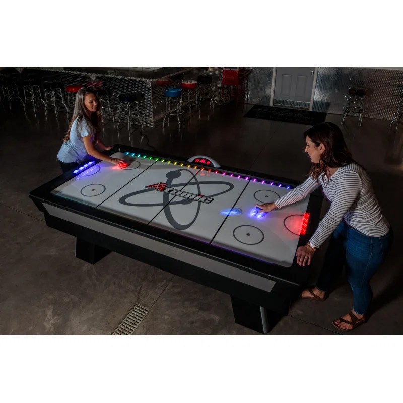 Atomic Top Shelf 7.5’ Air Hockey Table with 120V Motor for Maximum Air Flow, High-Speed PVC Playing Surface for Arcade-Style Play and Multicolor LED Lumen-X Technology. 90'' L X 49'' W X 31.25'' H
