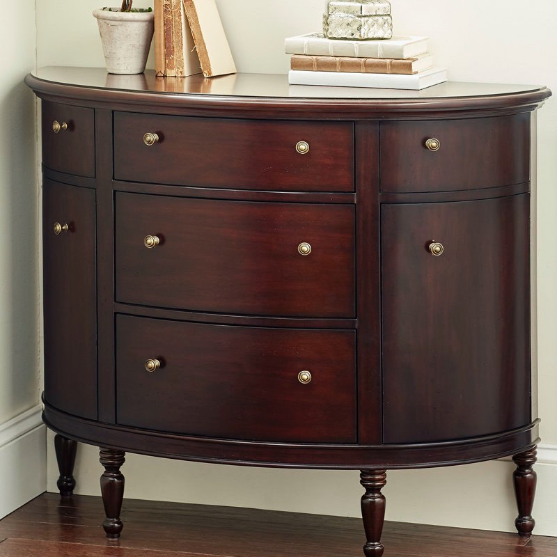 Annaira Accent Chest Made of Mahogany, 2 Cabinets with Shelves, 3 Drawers, Steel Knobs. Door needs rehinged, small crack on trim and bottom drawer, otherwise functionality and design in great condition 34'' H X 41'' W X 16'' D