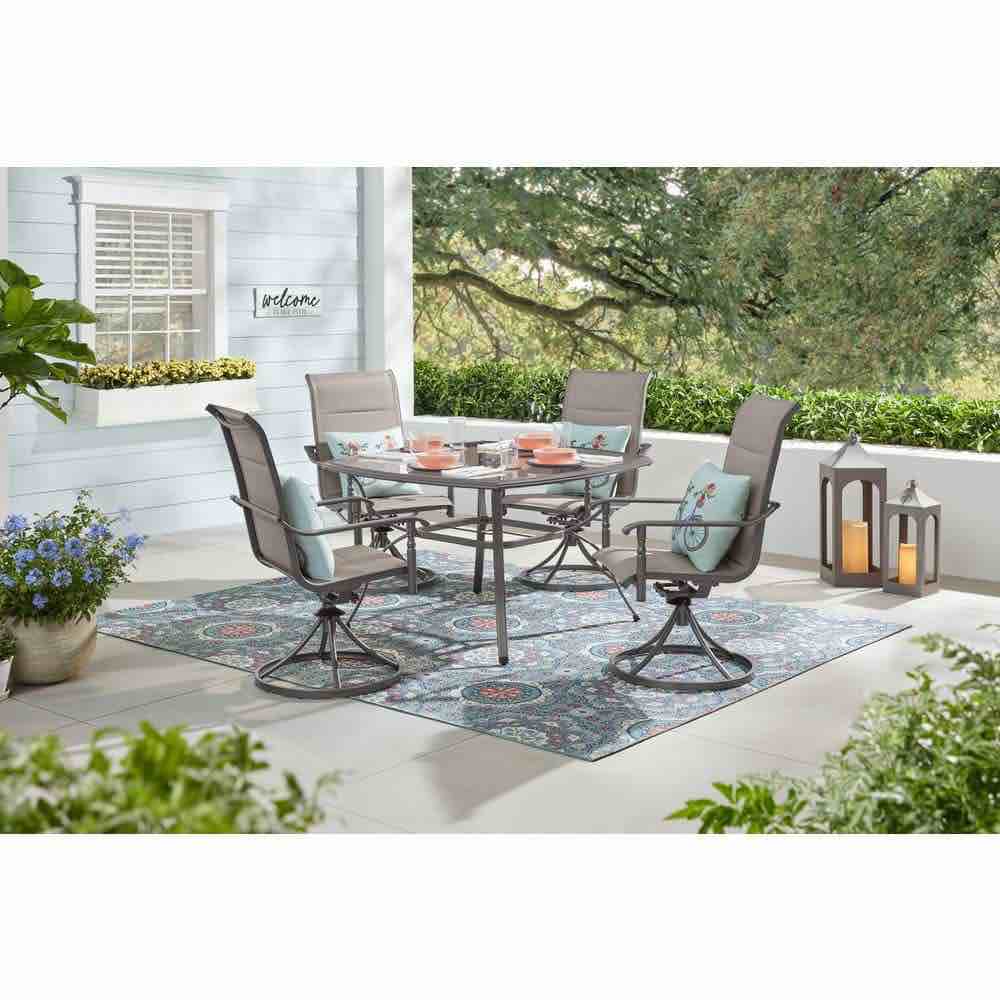 Ashbury Pewter 5-Piece Steel Padded Sling Square Glass Top Outdoor Dining Set. 4 Powder Coated Steel Swivel Chairs in Pewter with Off Beige Mesh Seating, and All Weather Tinted Glass Patio Table with Powder Coated Steel Frame in Pewter.