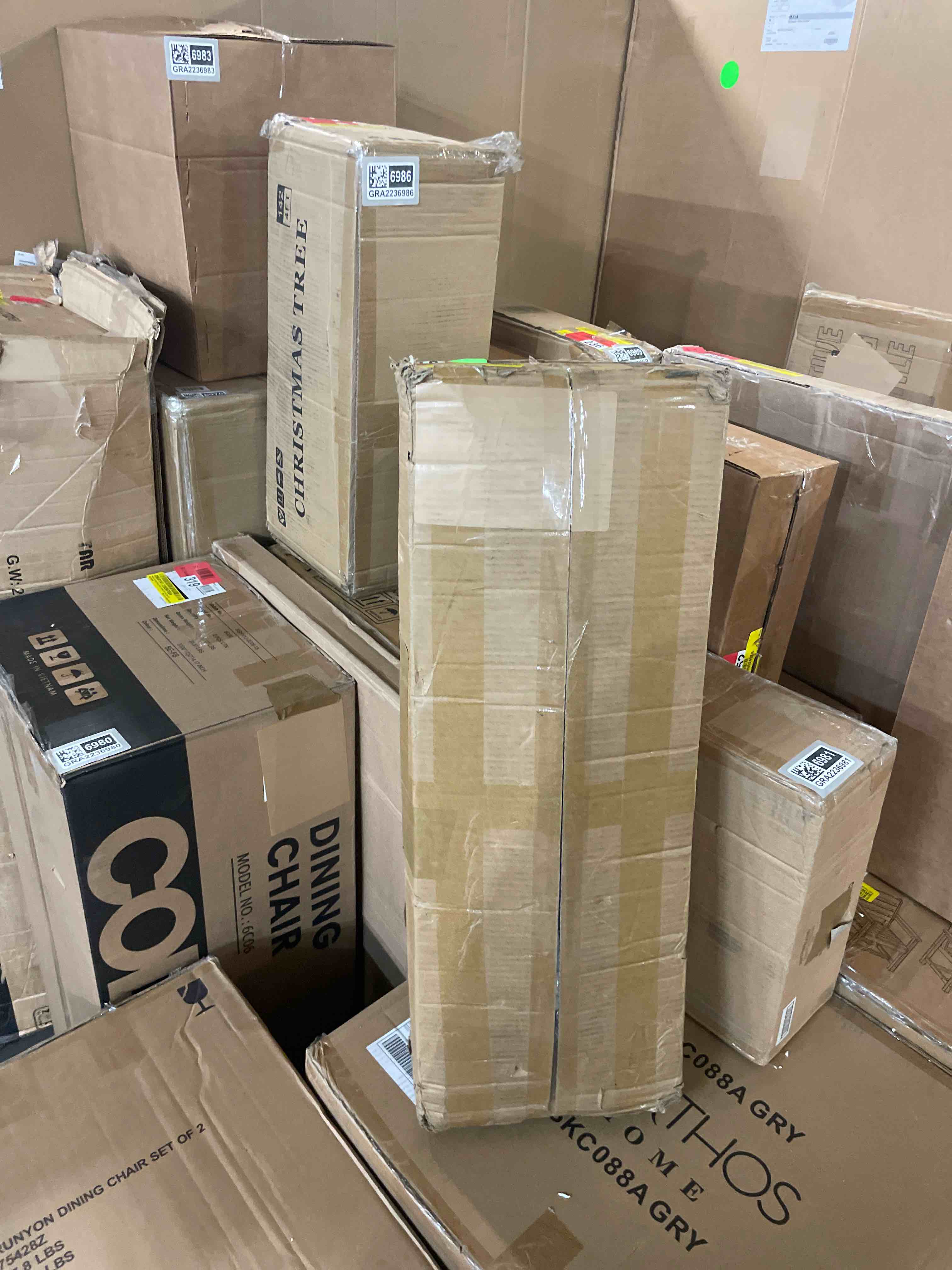 Condition photo showing New/Like New for homeroots earth friendly taupe folding luggage rack with dark tan straps