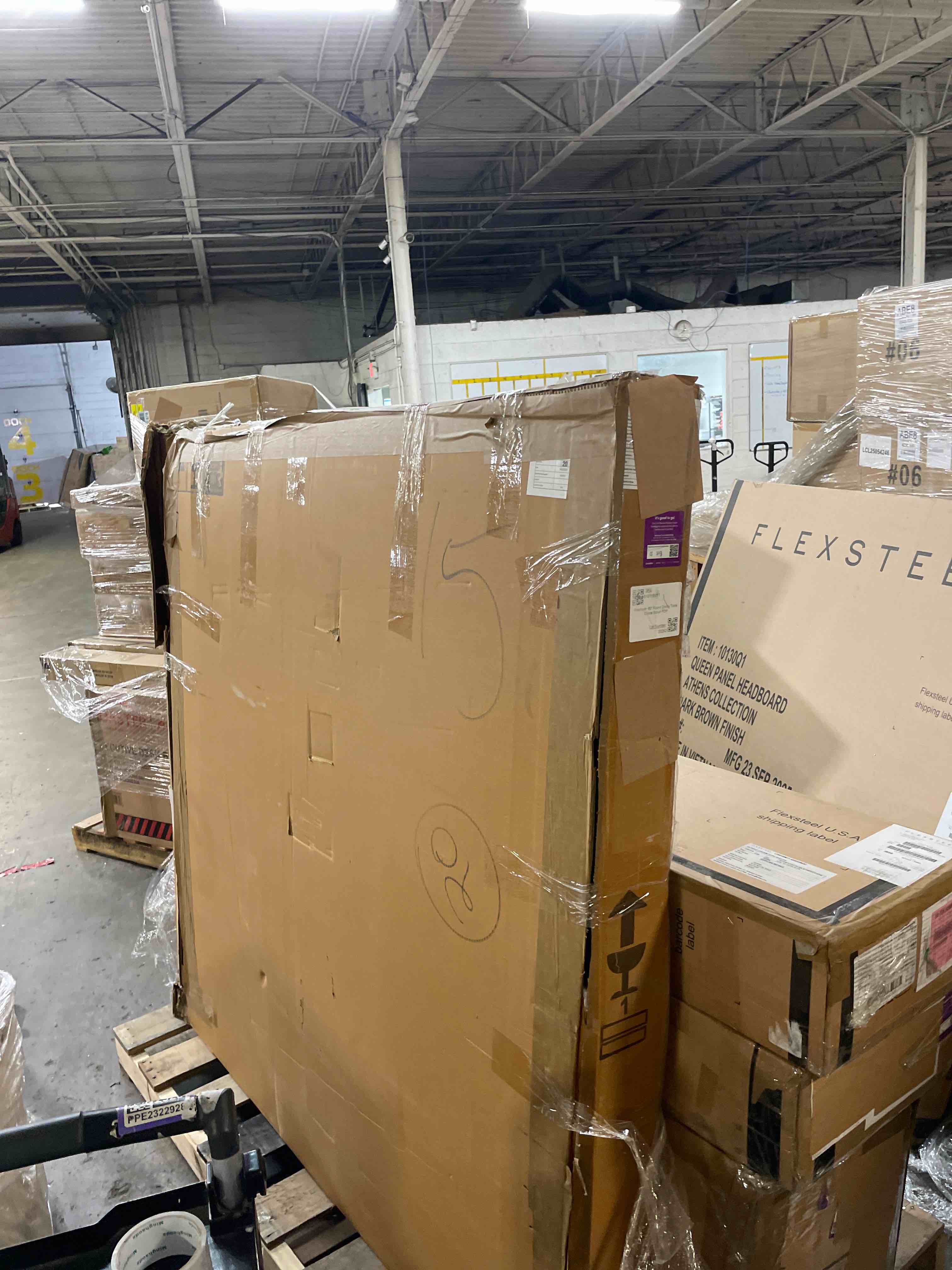 Condition photo showing As Is for classic home brookside 60" round mango wood dinning table in cocoa brown (table top only)