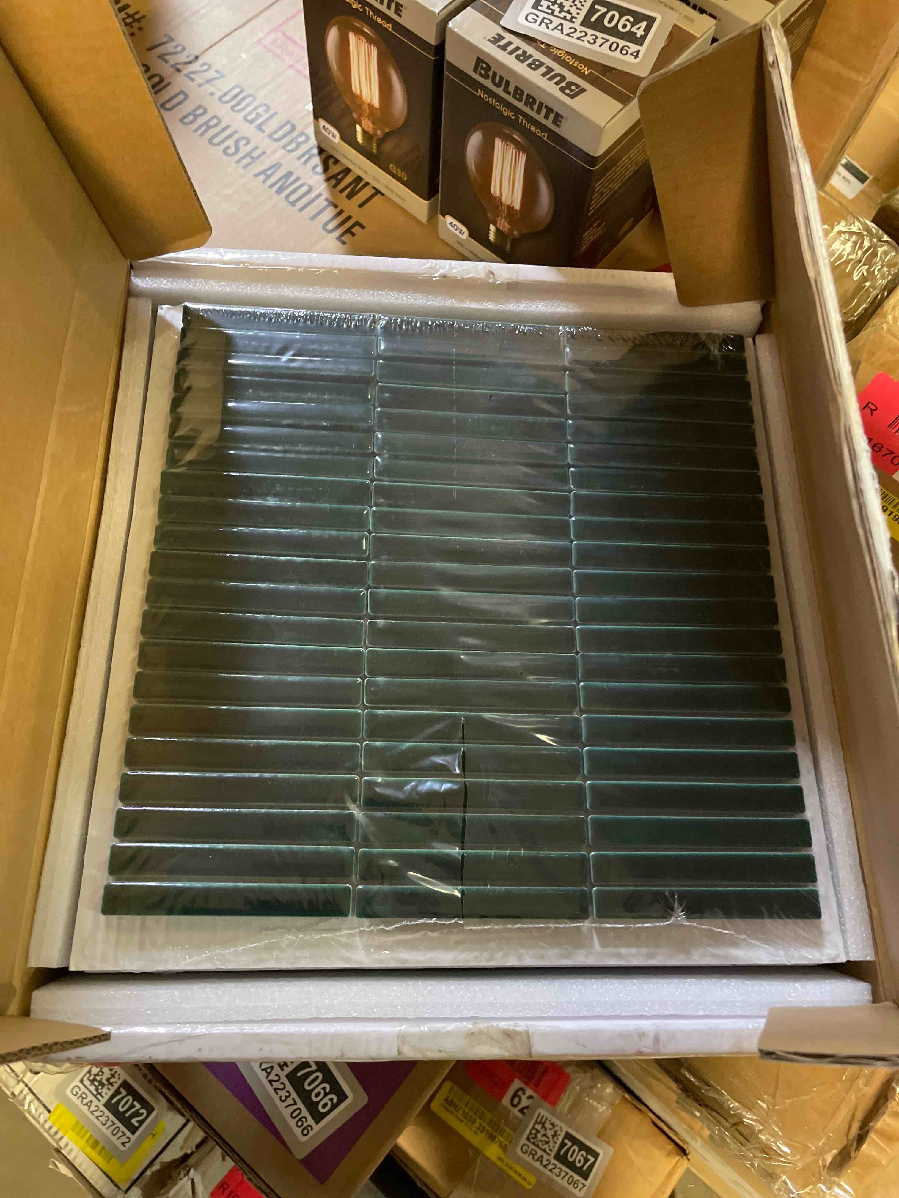 Condition photo showing New/Like New for 12" x 12" stacked glossy porcelain floor & wall mosaic tile