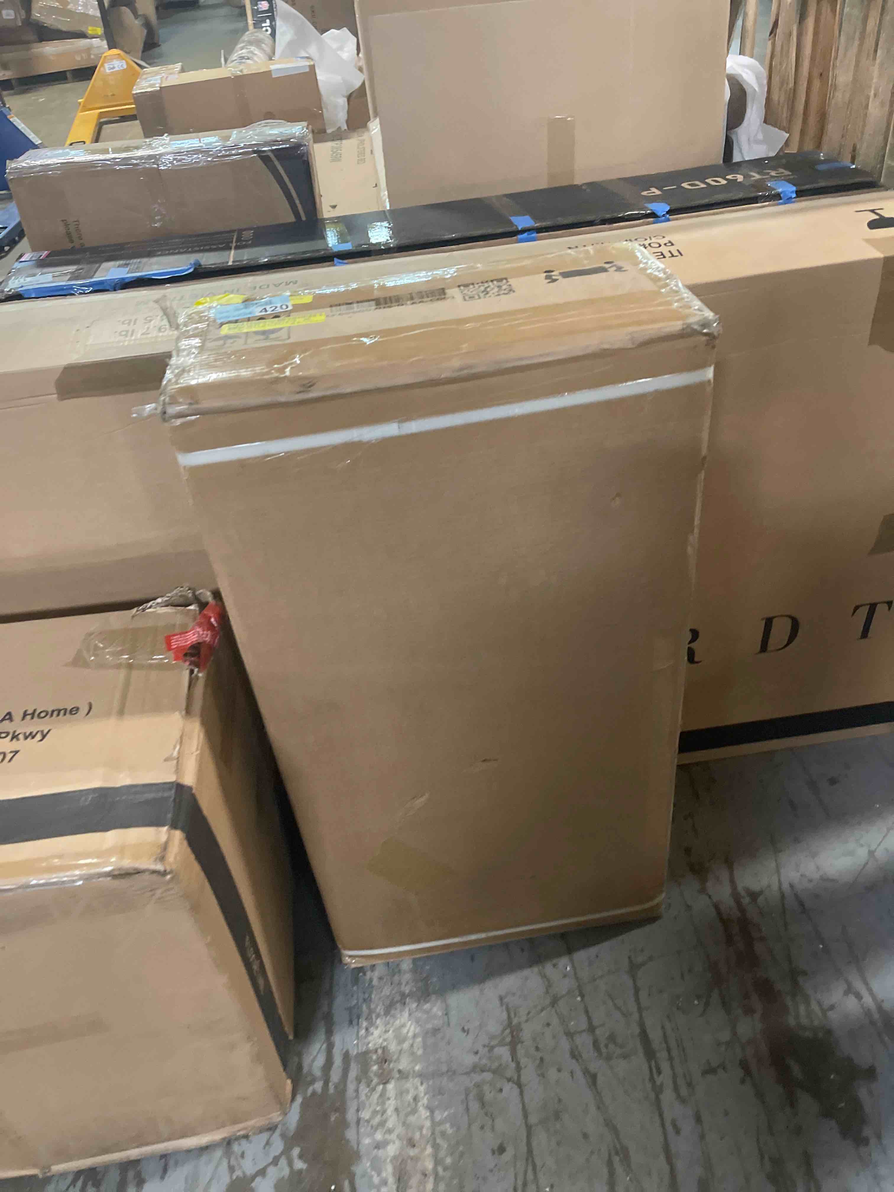 Condition photo showing As Is for 115.5'' w electric fireplace with 10-shelf wood mantel surround