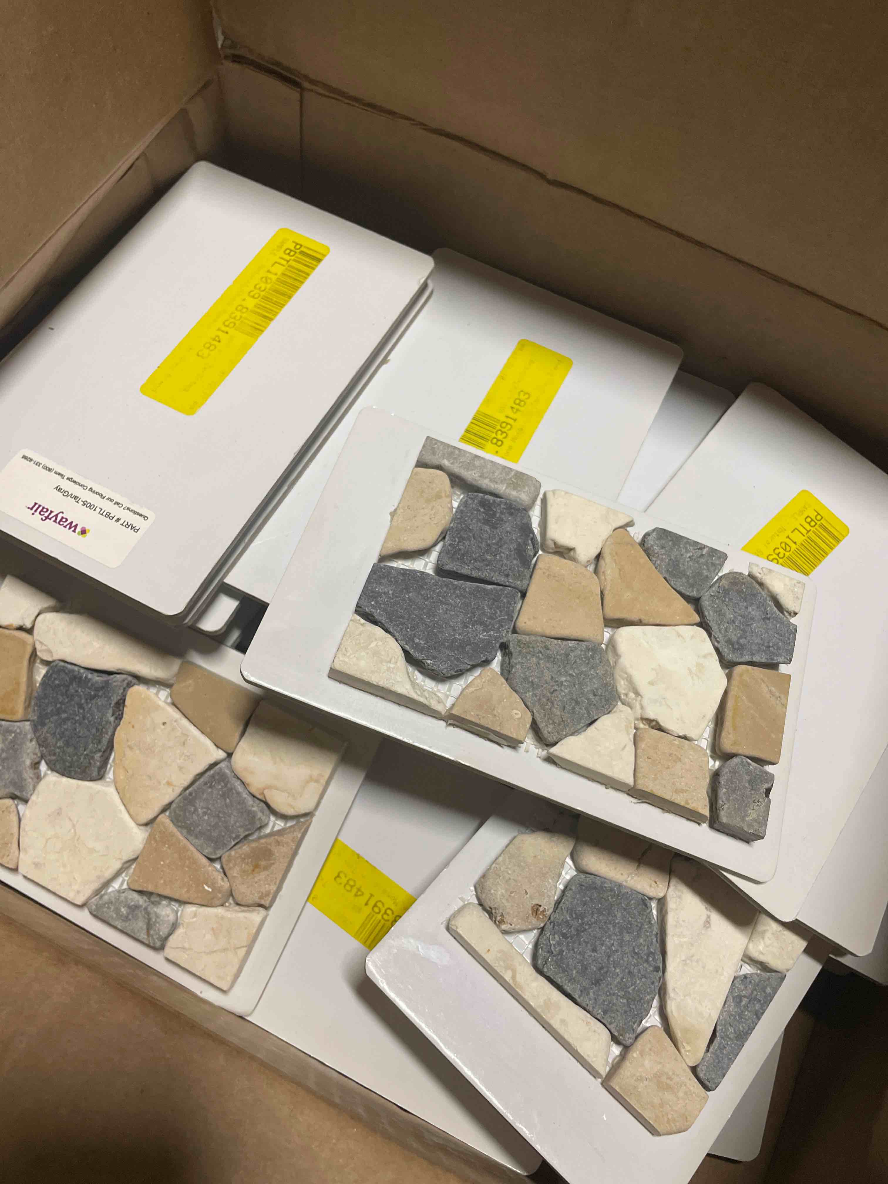 Condition photo showing New/Like New for box of samples natural stone mosaron  grey