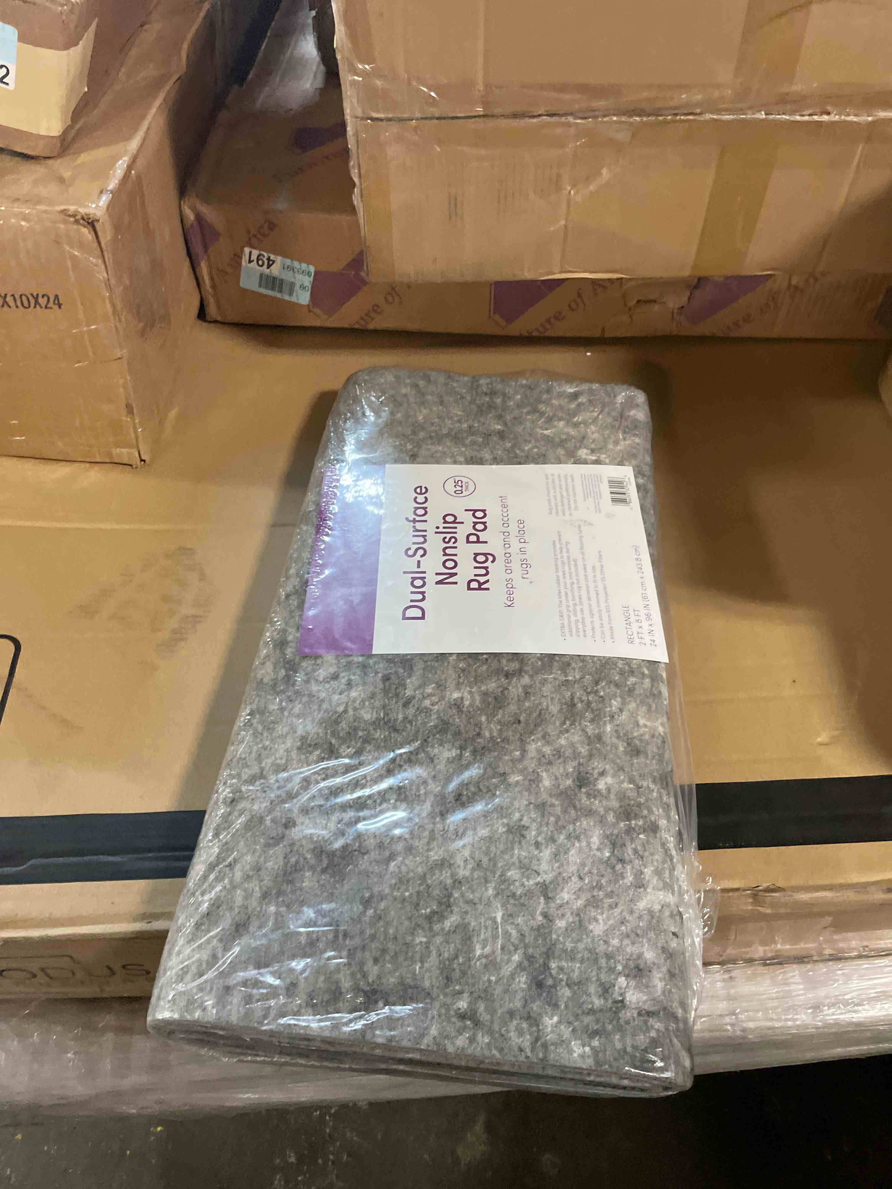 Condition photo showing New/Like New for mohawk home 2' x 8' non slip rug pad gripper 1/4 thick dual surface felt + rubber gripper - safe for all floors