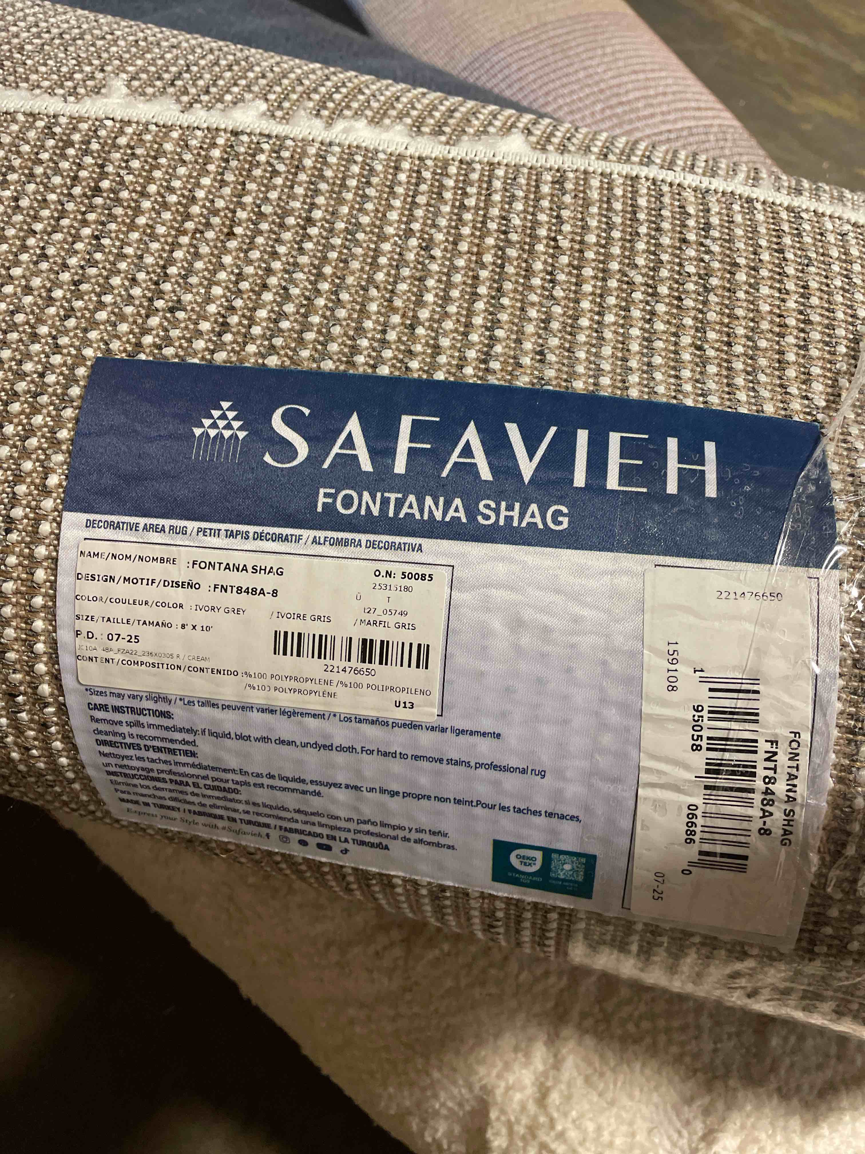 Condition photo showing New/Like New for SAFAVIEH Area Rug 8x10 - Fontana Shag Collection - Large - Ivory & Grey, Modern Design, Non-Shedding & Easy Cleaning, Ultra Plush Thick Pile, Ideal for Living Room, Bedroom, Dining Space (FNT848A)