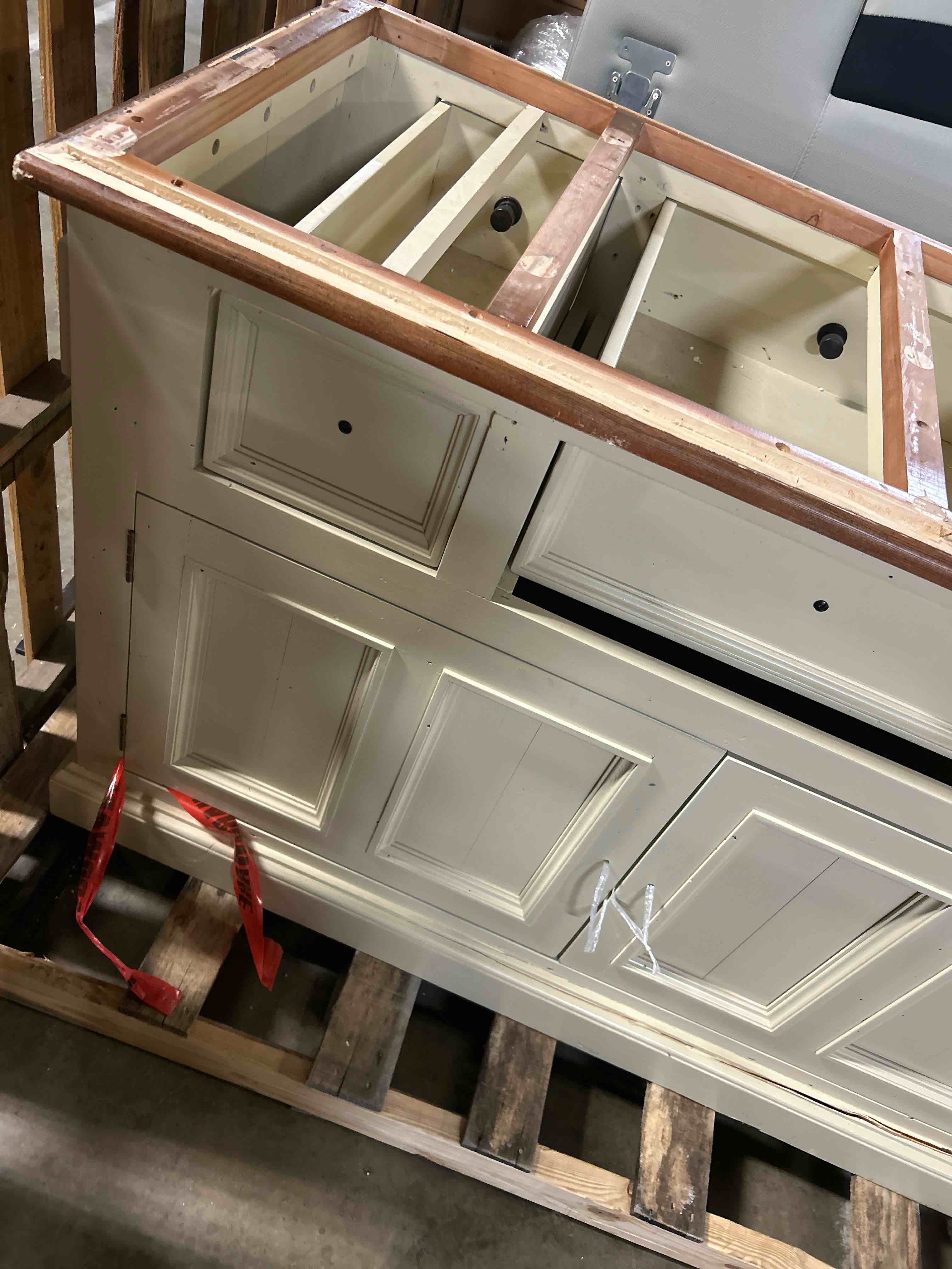 Condition photo showing As Is for Harpenden Kitchen Island(cracked at bottom and missing top and knobs for cabinets and drawers)