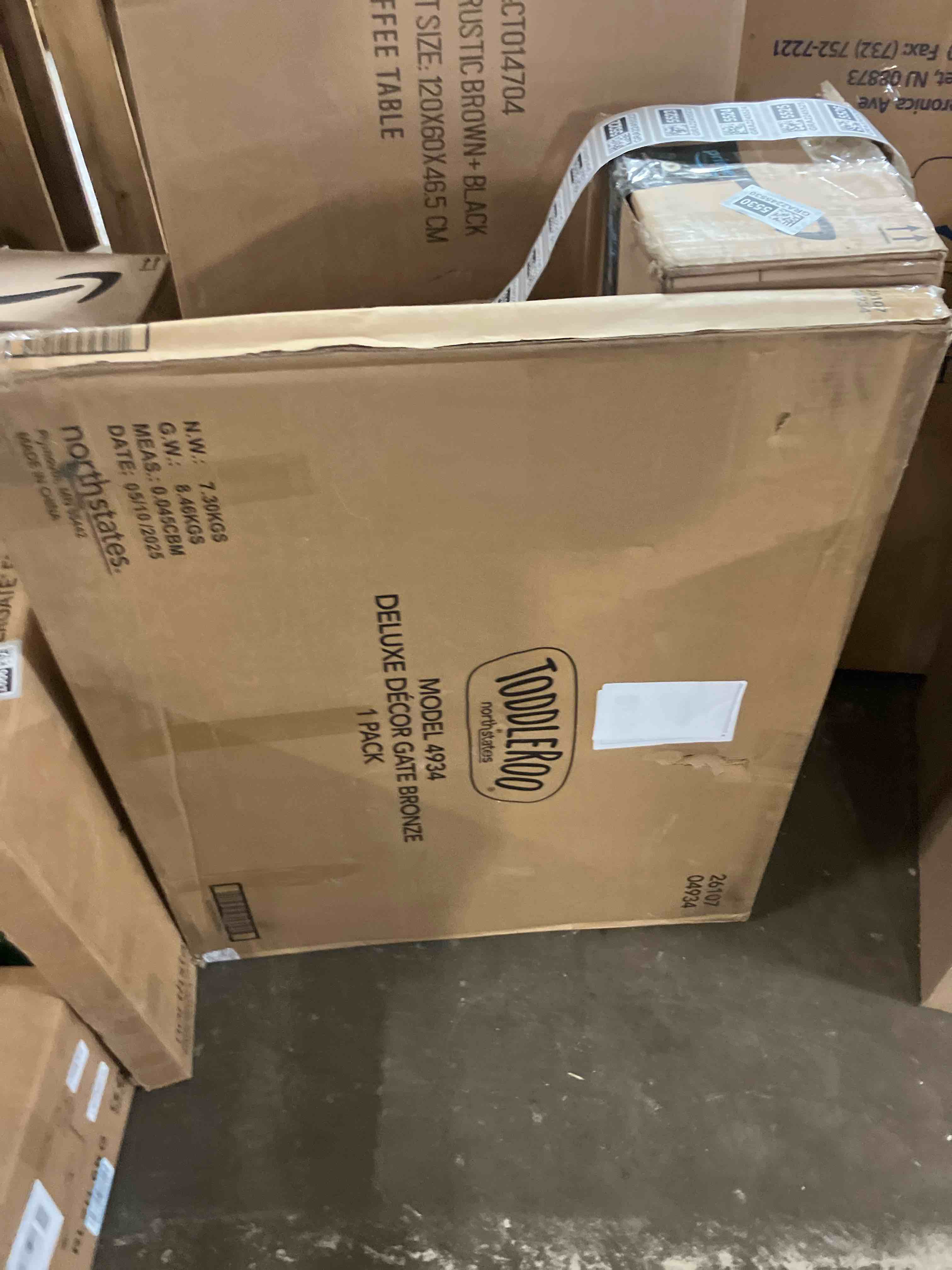 Condition photo showing New/Like New for Toddleroo by North States - Deluxe Décor Safety Gate: Extra Wide Baby Gate - Adjustable 38.3 to 72 Inches Wide - 30 Inches Tall - Matte Bronze Baby Gate 72" Wide Gate Matte Bronze