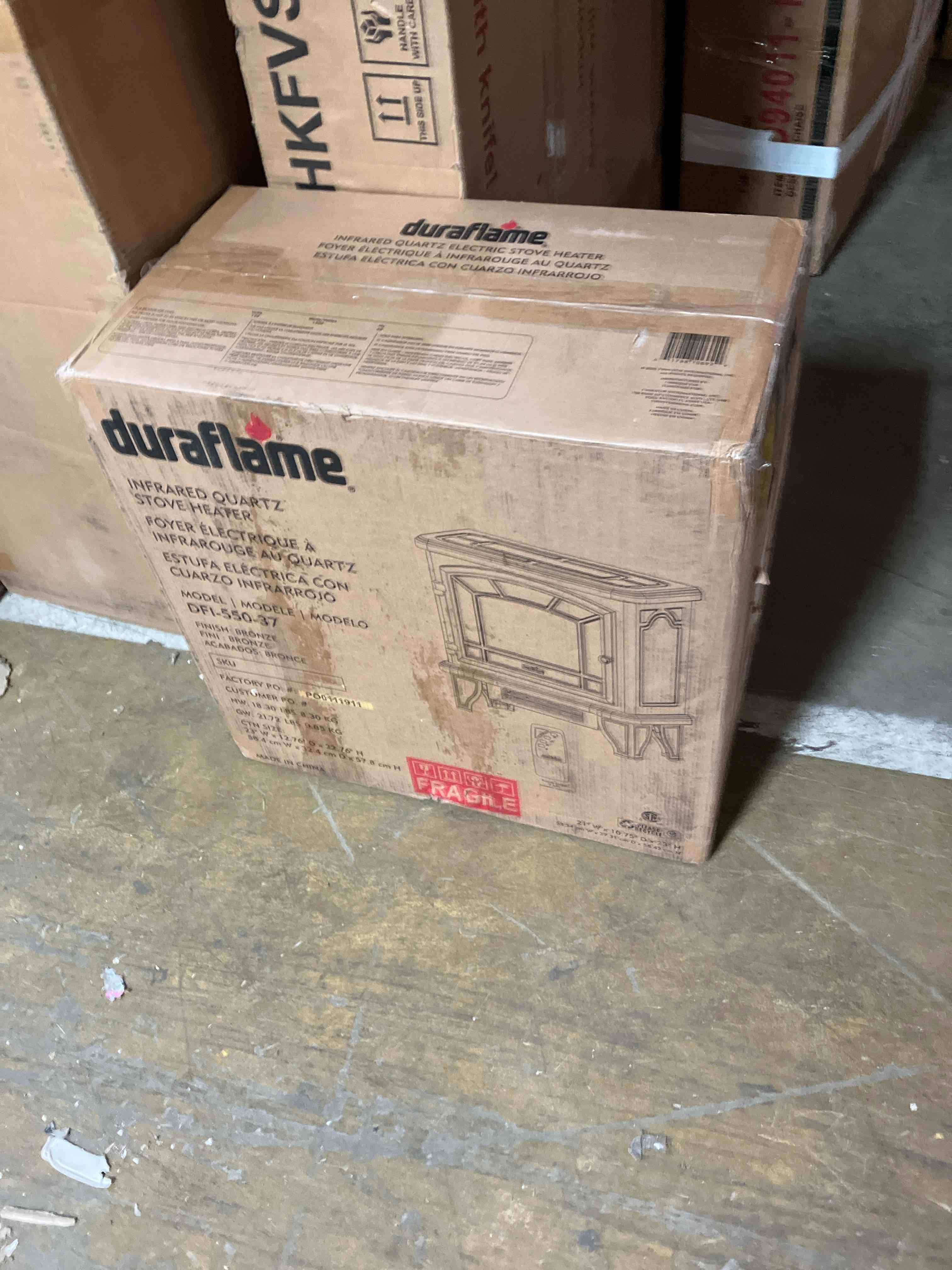 Condition photo showing New/Like New for duraflame Freestanding Electric Fireplace Stove Heater with 3D Flame Effect for 1,000 Sq. Ft, Bronze