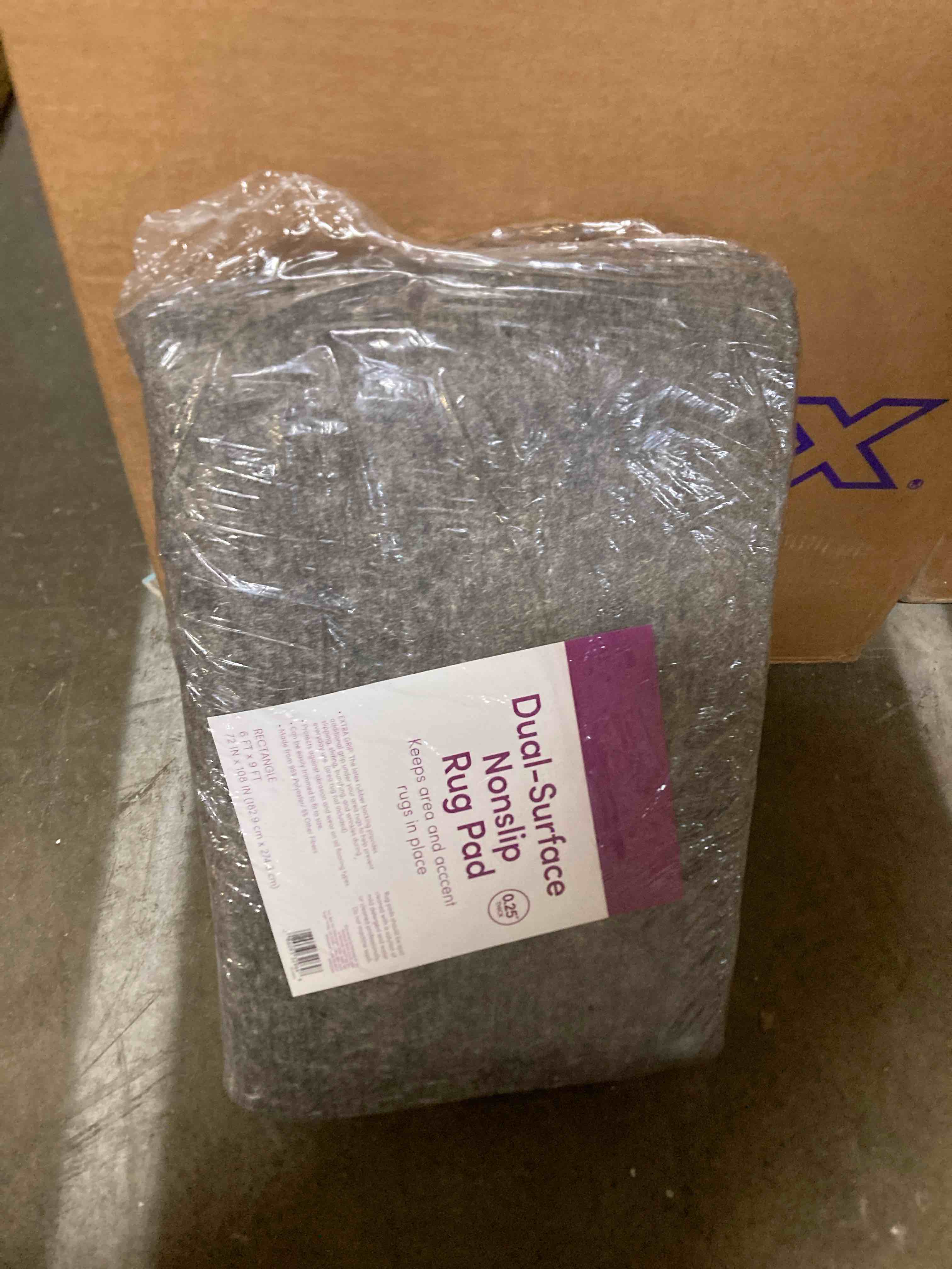 Condition photo showing New/Like New for Mohawk Home 6' x 9' Non Slip Rug Pad Gripper 1/4 Thick Dual Surface Felt + Rubber Gripper - Safe for All Floors, Synthetic Fiber, Brown