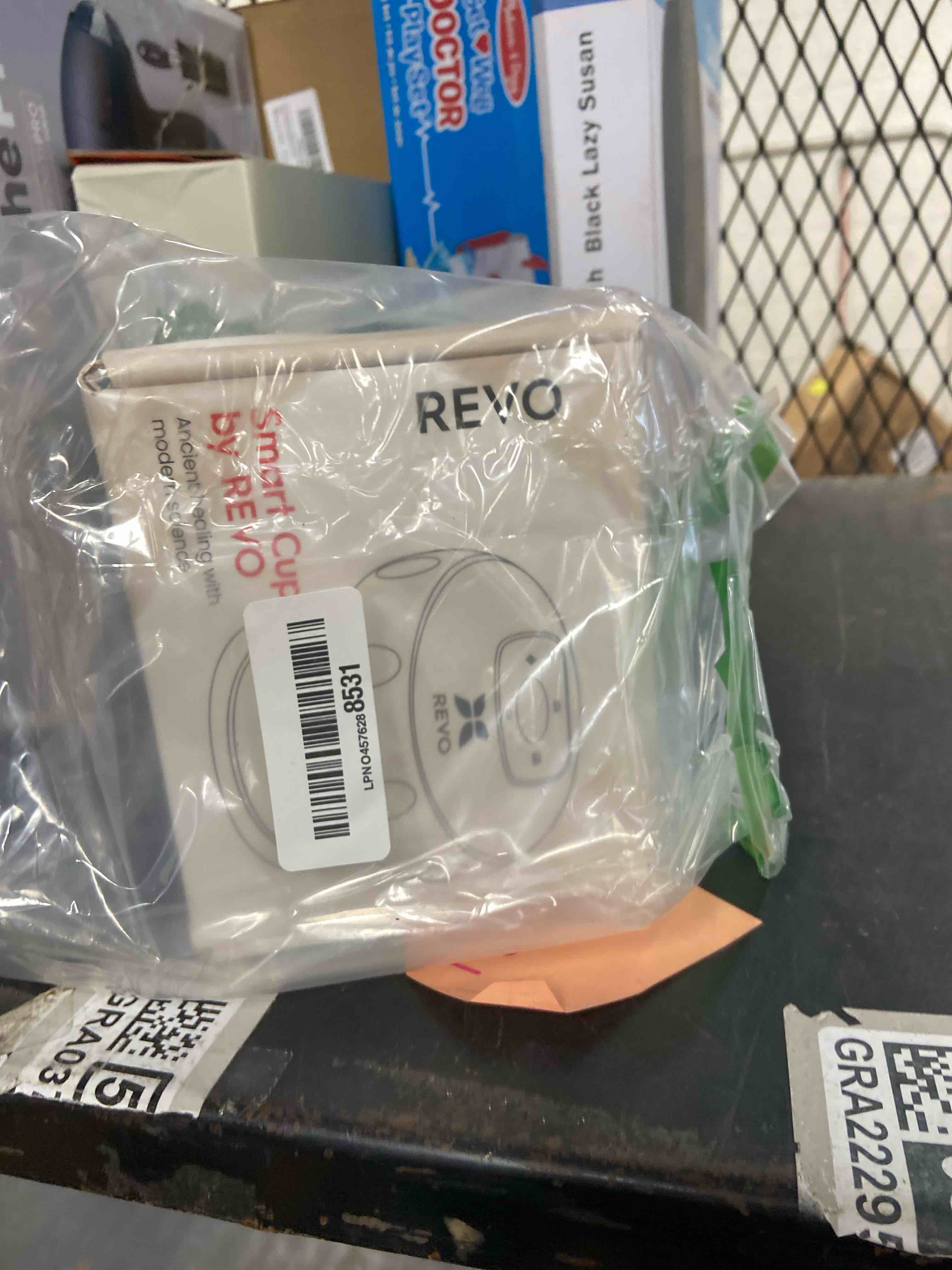 Condition photo showing New/Like New for REVO The Original 4-in-1 Smart Cupping Therapy Massager, Red Light Therapy for Targeted Pain Relief, Knots, Aches, Muscle Soreness, Circulation & Tighter Skin, Portable Cupping Kit 1 Pack