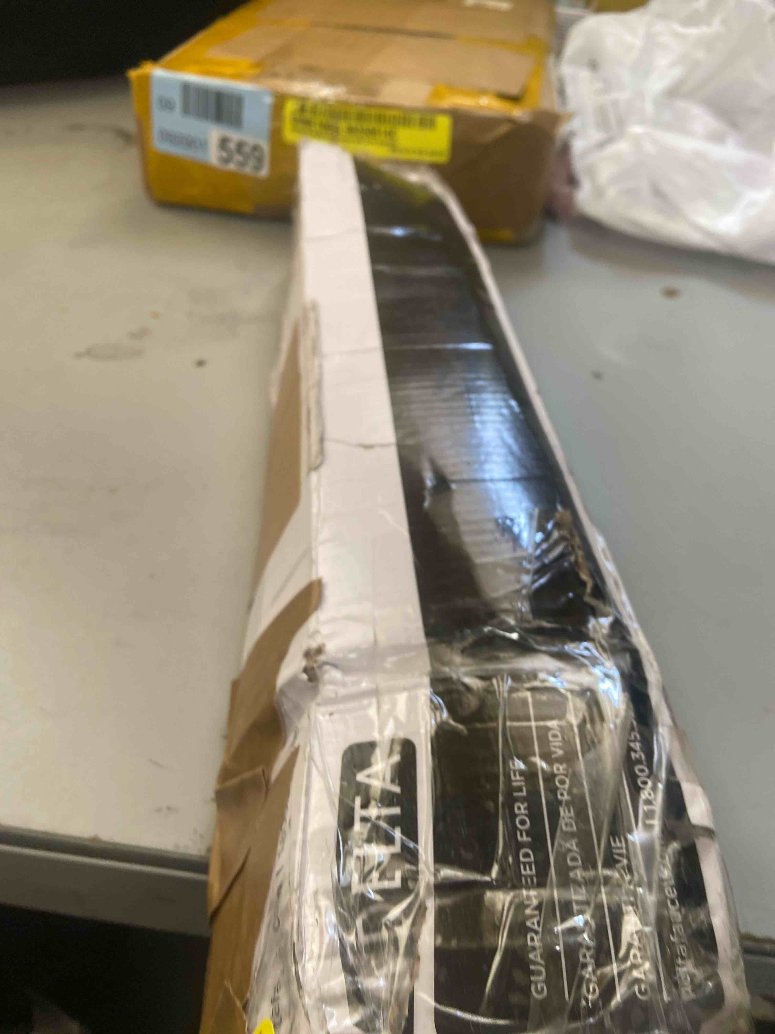 Condition photo showing Good Condition for Delta 75918-CZ Trinsic 18 in. Towel Bar in Champagne Bronze