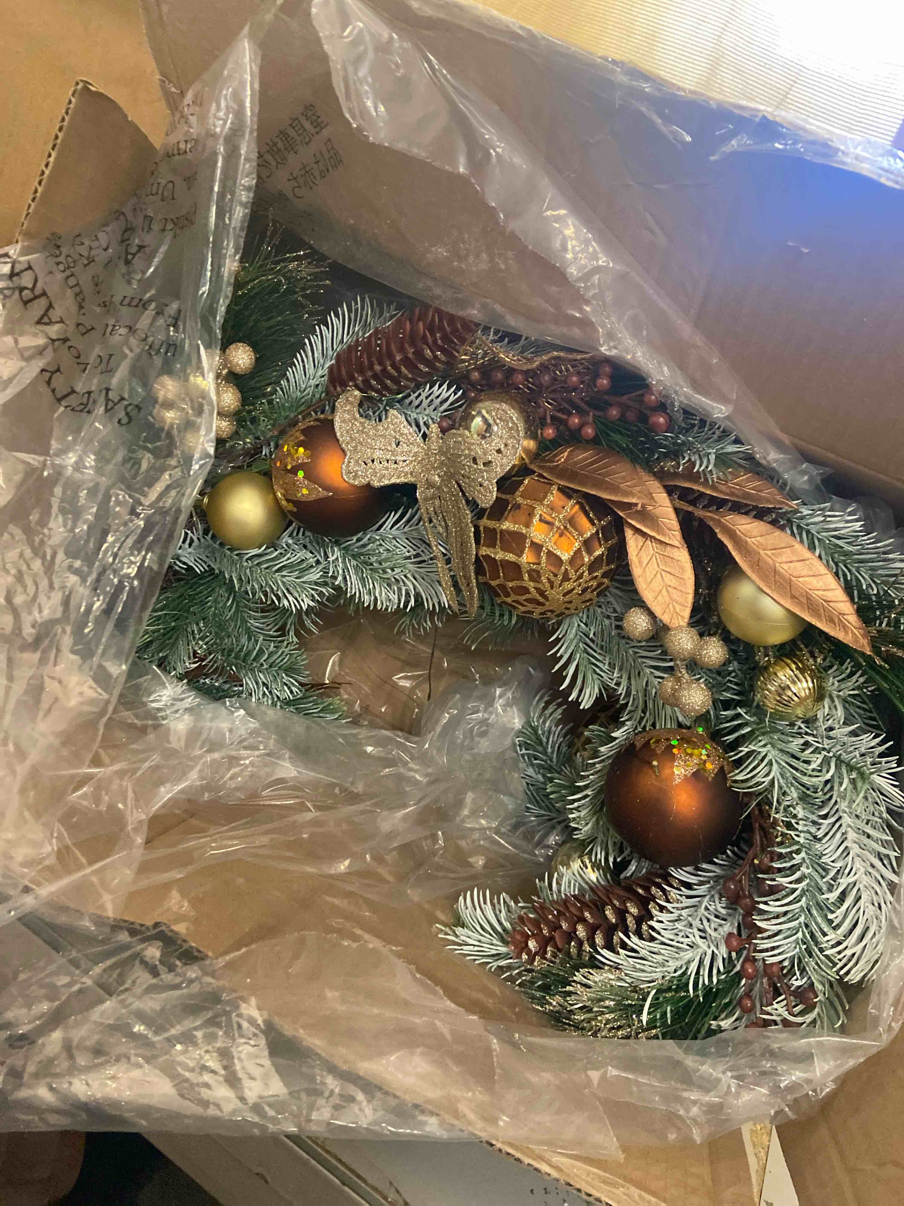 Condition photo showing New/Like New for Valery Madelyn 20'' Pre-Lit Christmas Wreath for Front Door with Lights, Lighted Christmas Door Wreath with Copper Gold Xmas Balls Norfolk Pine Branches for Home Porch Fireplace Window Holiday Decor Copper/Gold 20 Inch