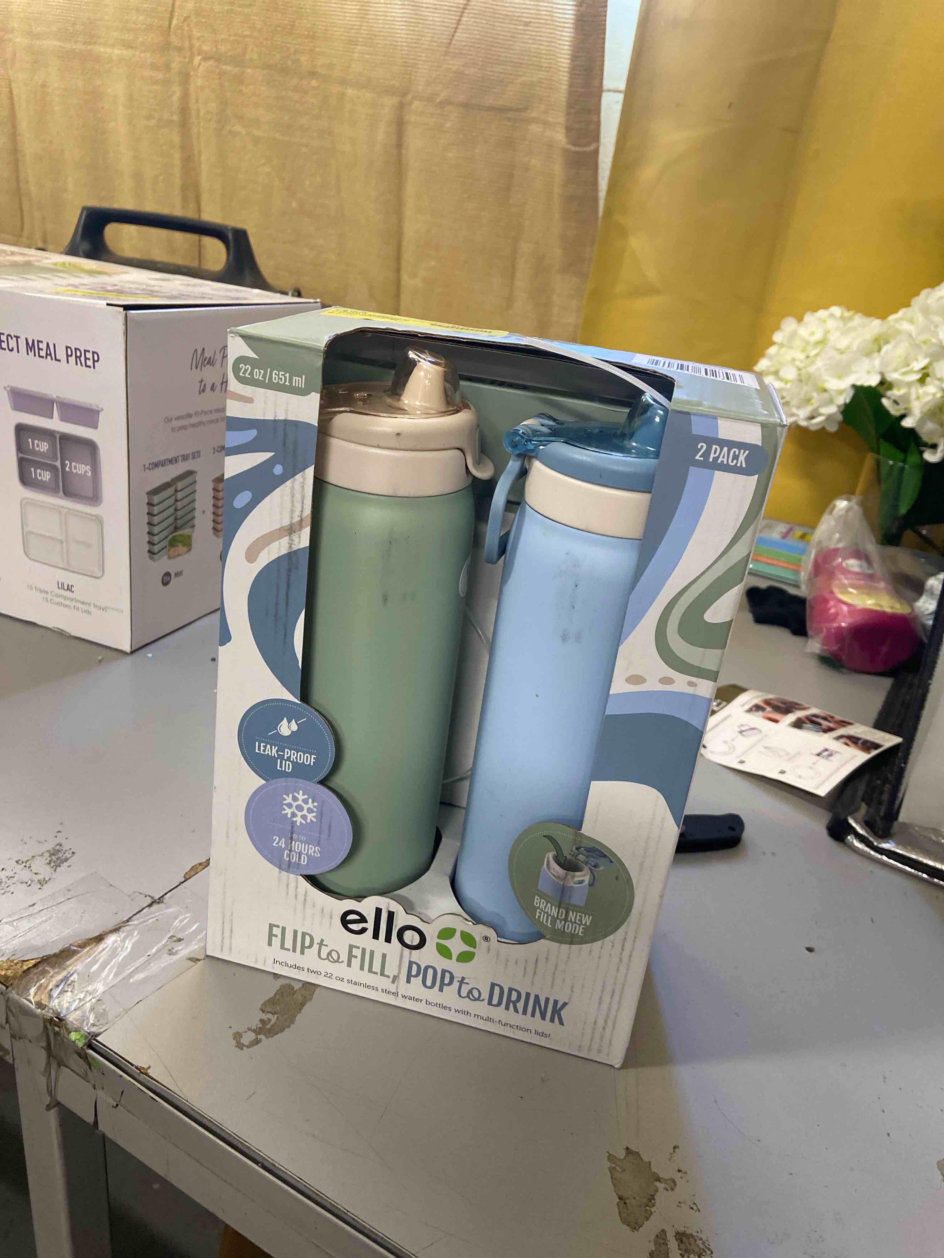Condition photo showing Good Condition for Ello Flip to Fill, Pop to Drink Stainless Steel Water Bottle with Leak-Proof Locking Lid, 22 oz β Reusable Insulated Travel Bottle, Color: Pistachio/Blue Dream