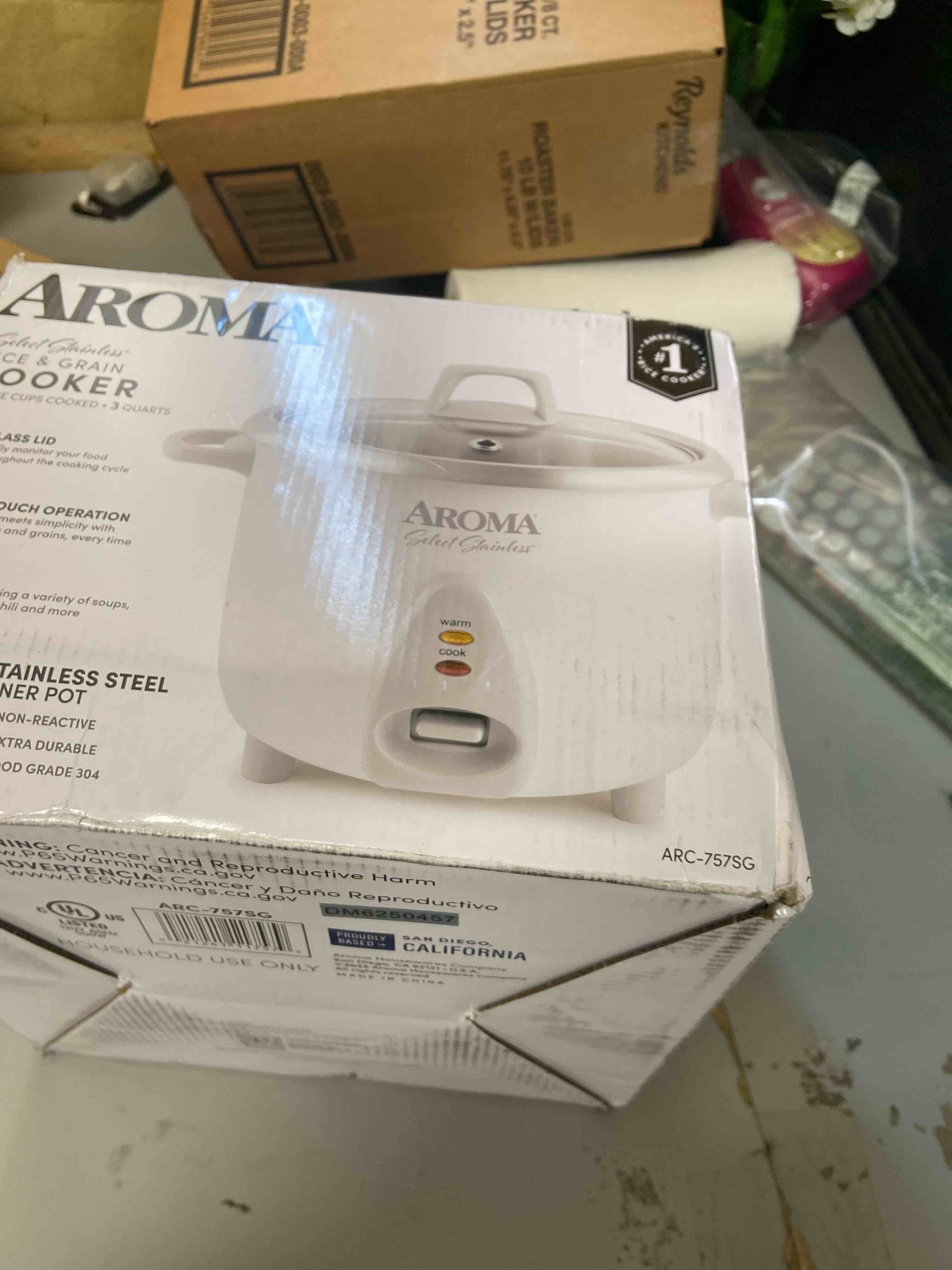 Condition photo showing New/Like New for AROMA® 14-Cup (Cooked) / 3Qt. Select Stainless® Rice & Grain Cooker  White  New  ARC-757-1SG