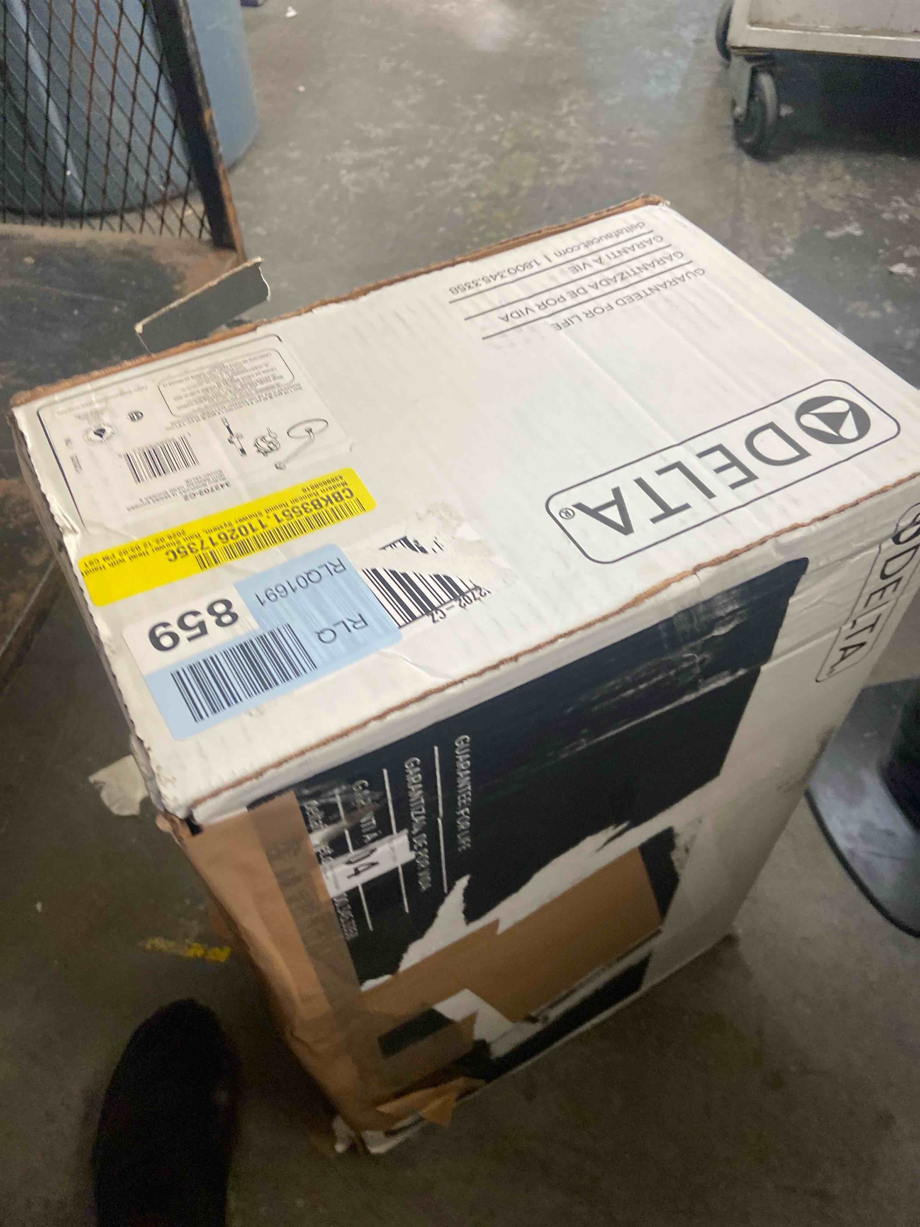 Condition photo showing Good Condition for Delta Faucet Modern Raincan 2-Setting Round Shower System Including Rain Shower Head and Handheld Spray Gold, Rainfall Shower System Gold, Shower Valve and Trim Kit, Champagne Bronze 342702-CZ