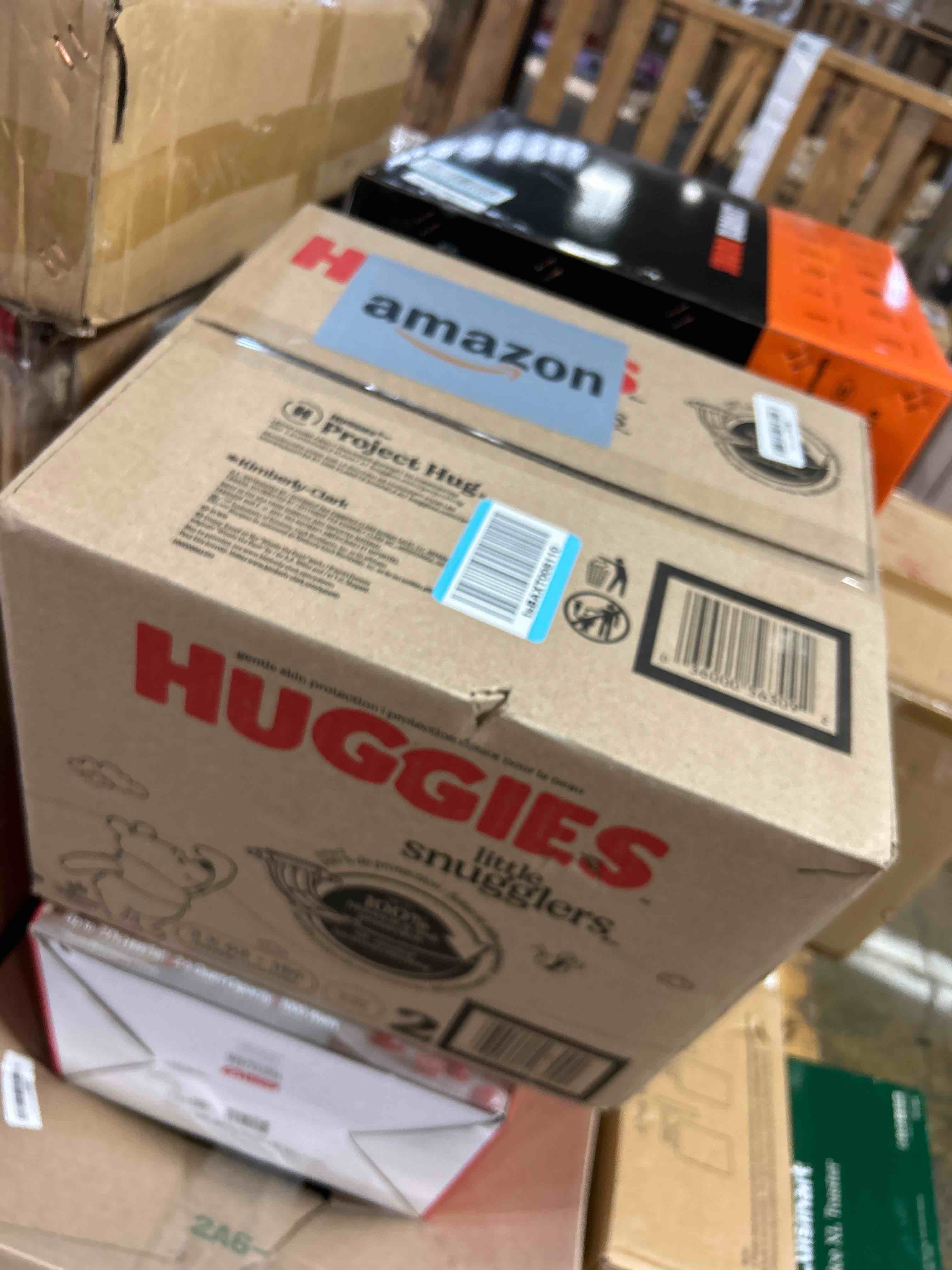 Condition photo showing New/Like New for Huggies Size 2 Diapers, Little Snugglers Baby Diapers, Size 2 (12-18 lbs), 186 Count (3 Packs of 62), Packaging May Vary
