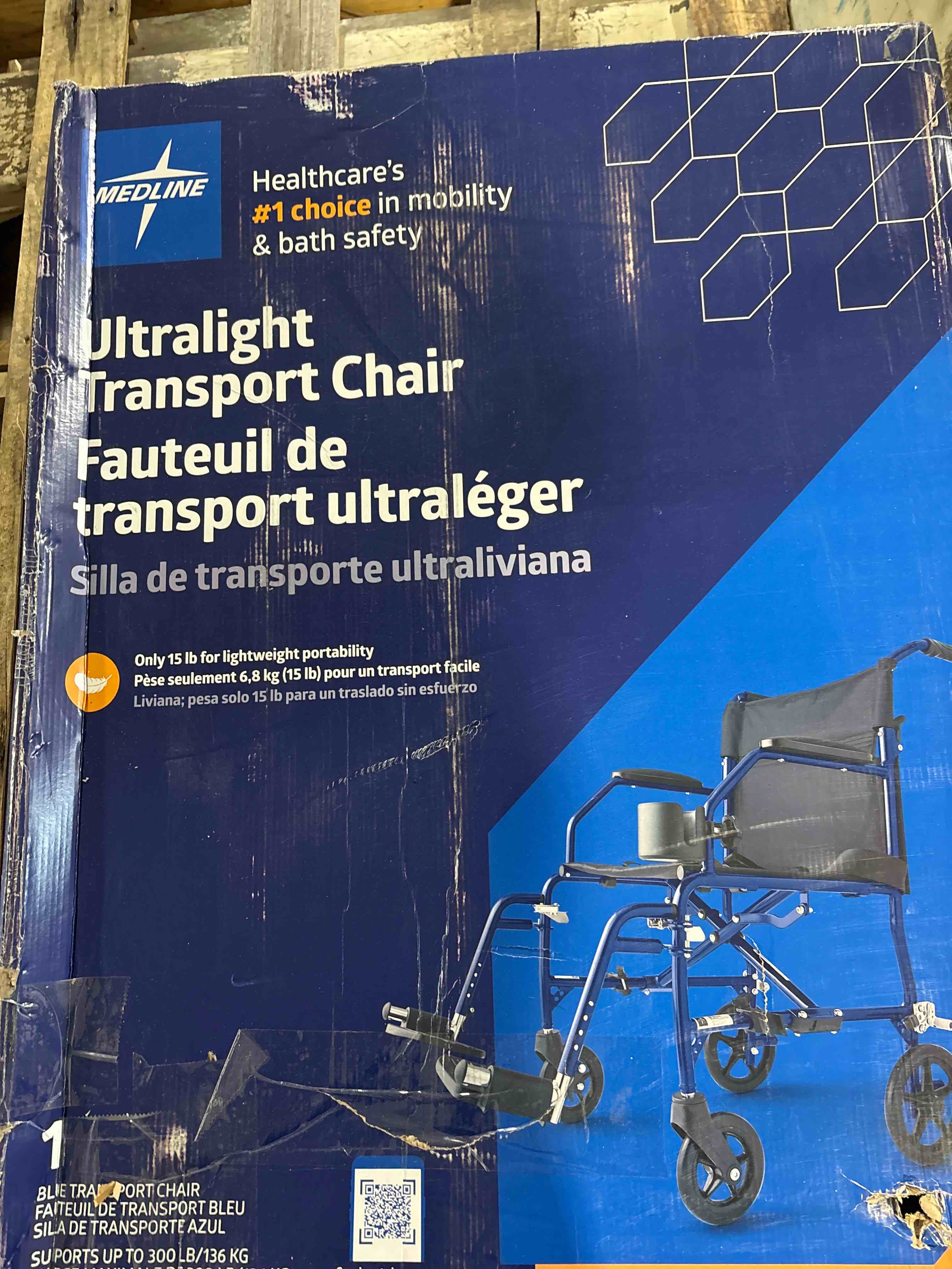 Condition photo showing New/Like New for Medline Lightweight Foldable Transport Wheelchair with Handbrakes and 12-Inch Wheels  Blue Frame  Black Upholstery
