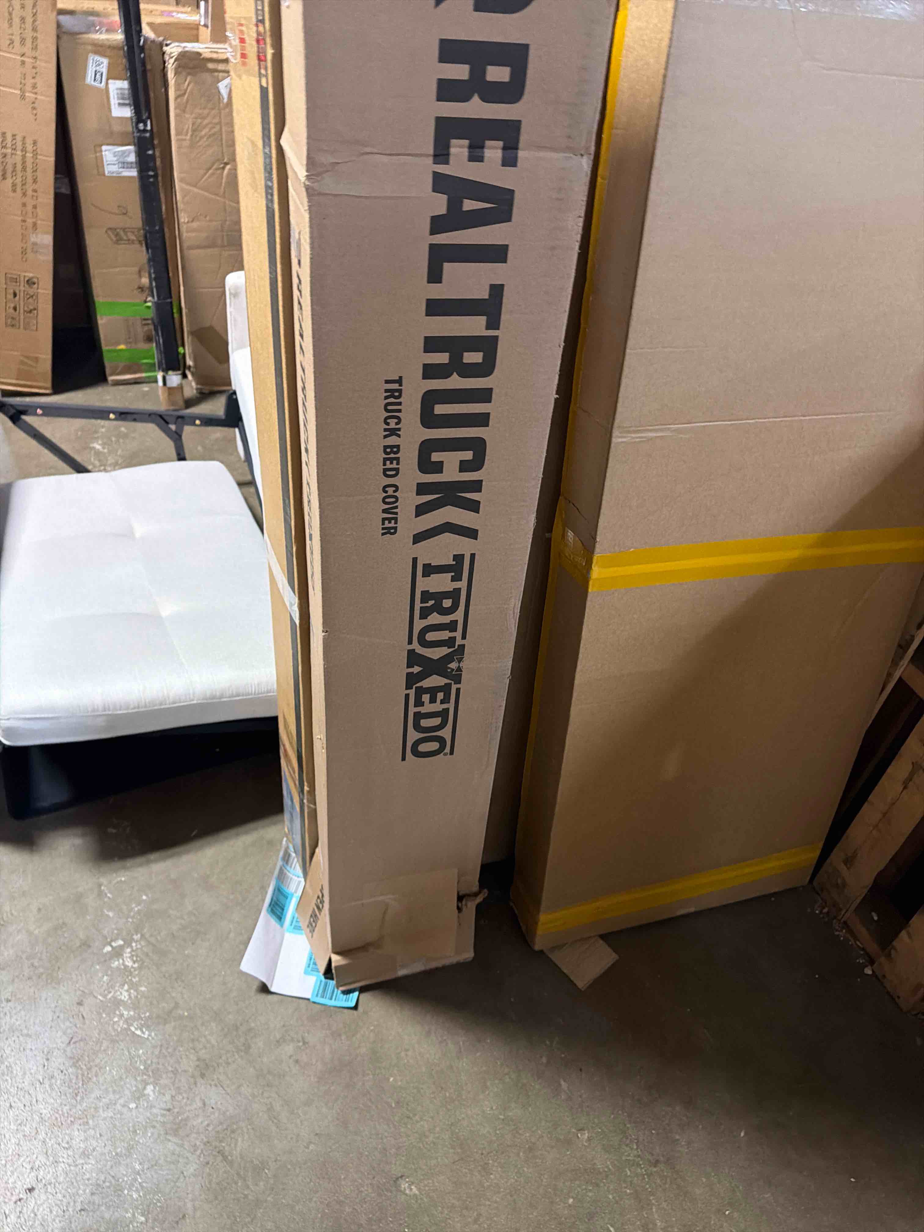 Condition photo showing New/Like New for The X-Cover by TRPx - Trailer and Truck Bed Cover Medium - Integrated Heavy Duty Black Tarp and Tie Down System. Fits: Short Bed, Standard Bed Trucks and Utility trailers up to 6'6" Medium - Standard Bed (Up to 6'6") Black