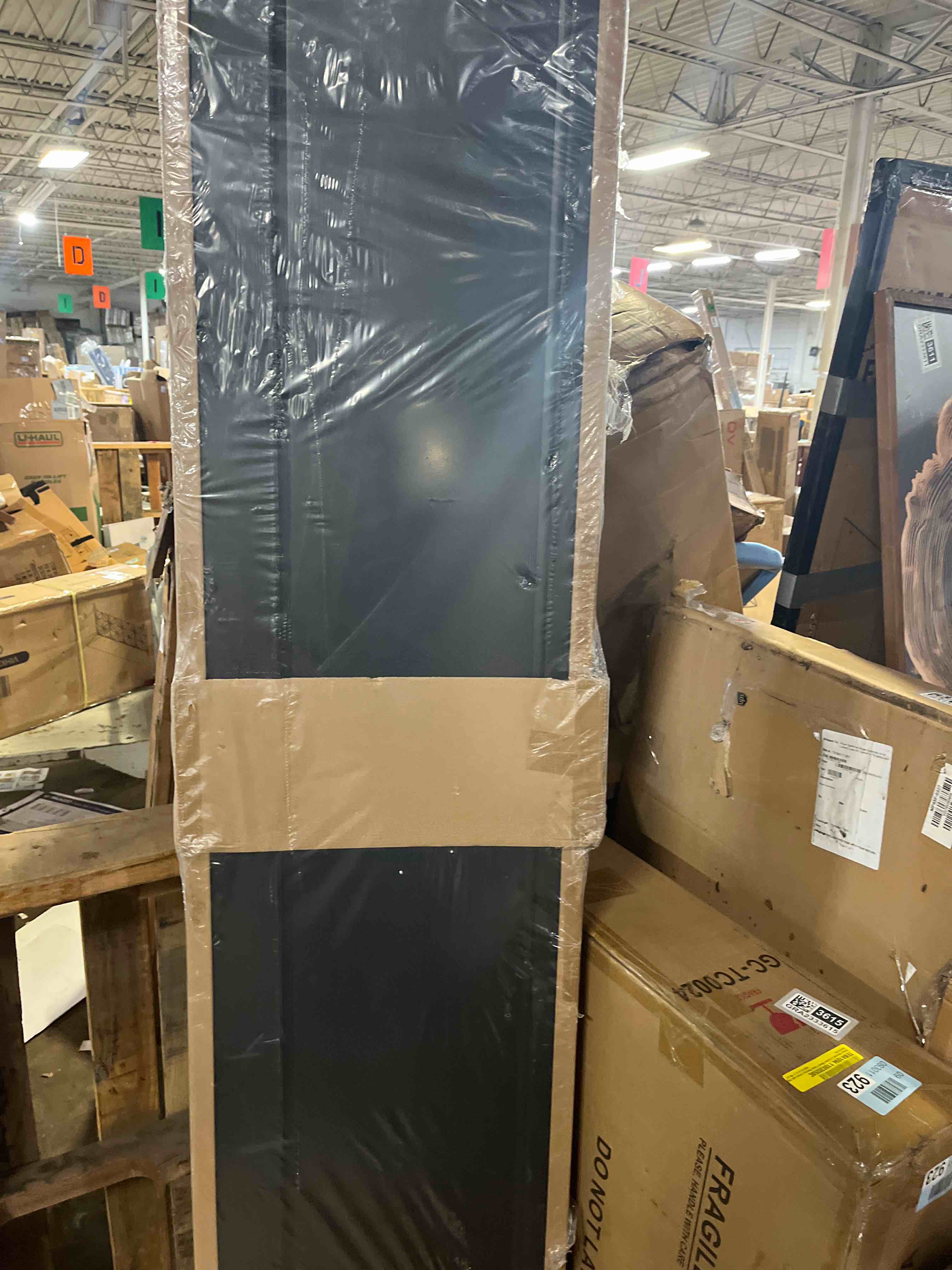 Condition photo showing New/Like New for 36"X84" 1-Panel Primed Composite Interior Bi-Fold Barn Door