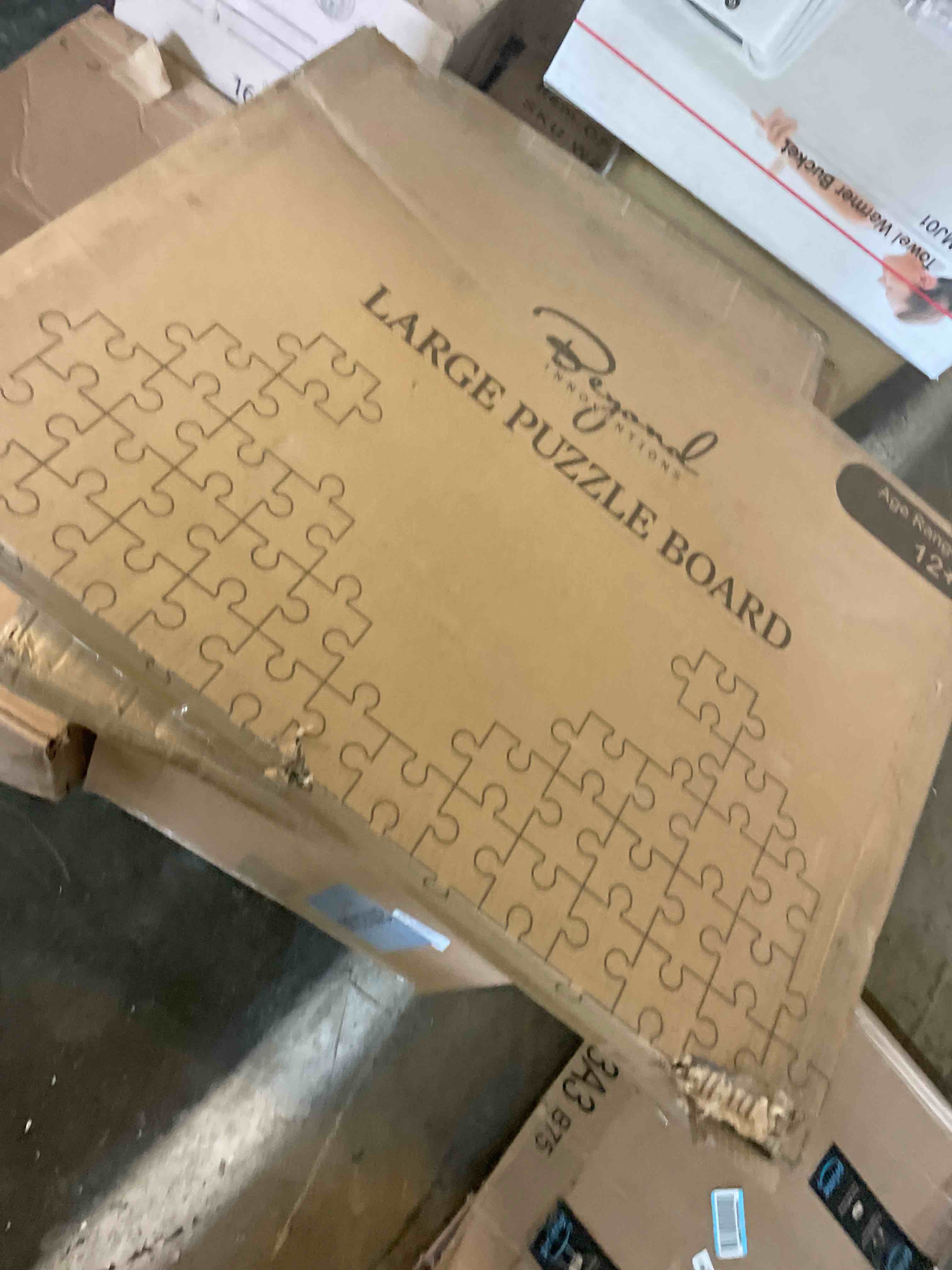 Condition photo showing New/Like New for 1000 Piece Rotating Puzzle Board with Drawers and Cover - 4 Drawers, Wooden Jigsaw Puzzle Table | 30” X 22”| Jigsaw Puzzle Board - Portable Puzzle Tables for Adults and Kids by Beyond Innoventions