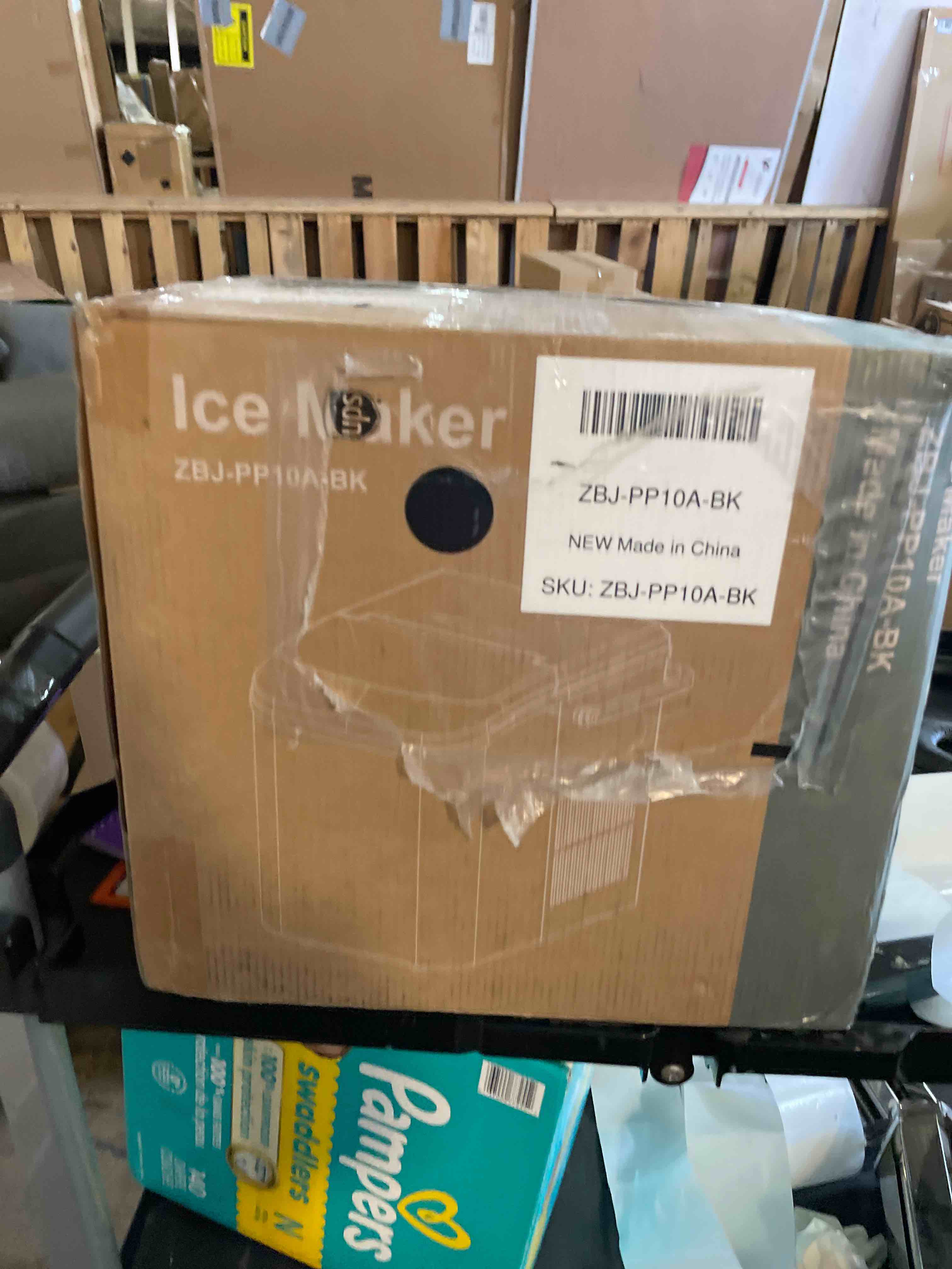 Condition photo showing Good Condition for DUMOS Countertop Ice Maker with Handle, 26lbs/24H Portable Ice Machine, 9 Bullet Ice Cubes Ready in 6 Mins, Self-Cleaning, Quiet Compact Ice Maker for Home, Kitchen, RV, Camping, Black Black 12.5"*11.6"*8.8"