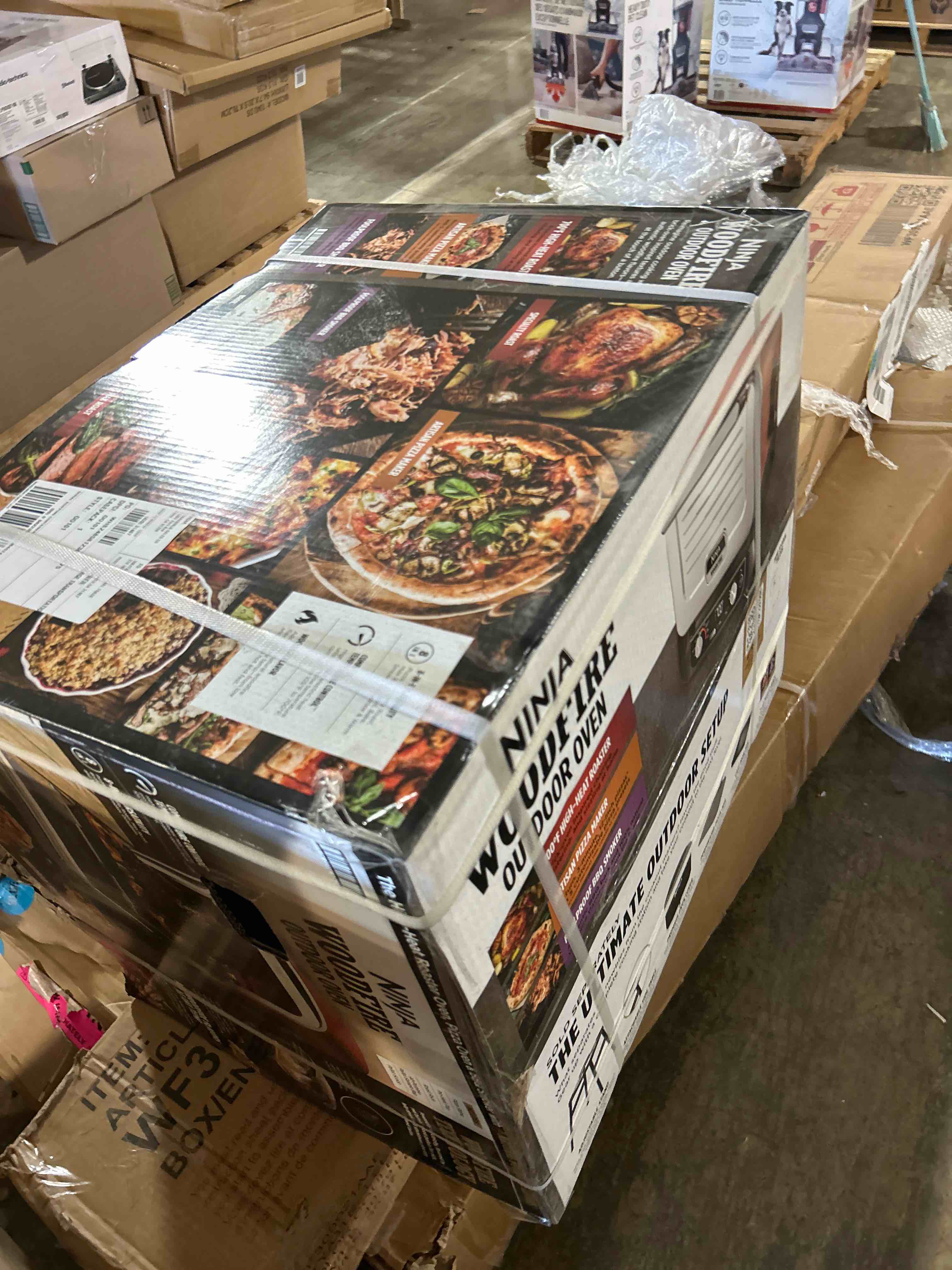 Condition photo showing New/Like New for Ninja Woodfire Outdoor Pizza Oven, 8-in-1 Portable Electric Roaster Oven, Heats up to 700°F, 5 Artisan Pizza Settings, Integrated BBQ Smoker Box, Includes Flavored Wood Pellets, Terracotta Red Pizza Oven + Smoker