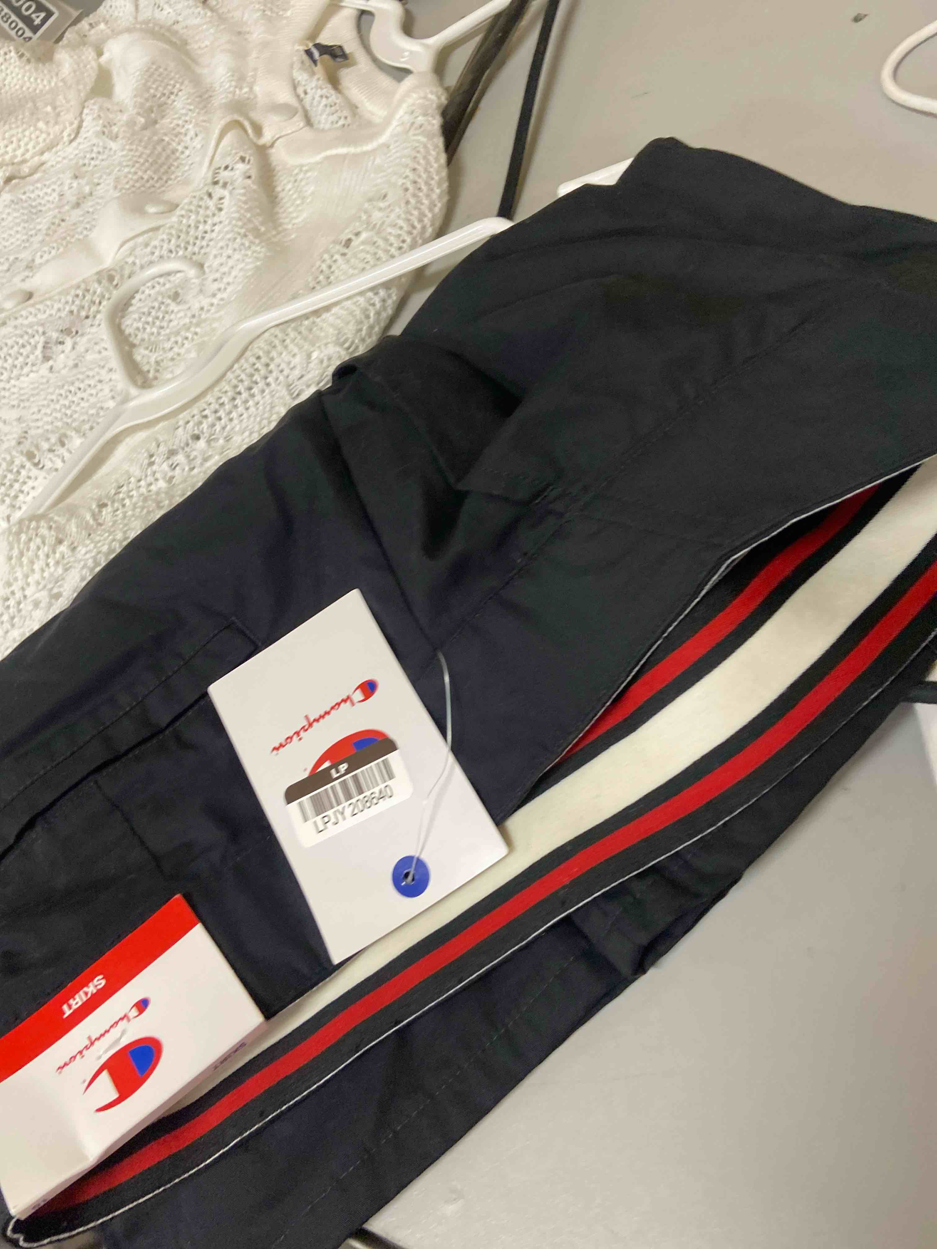 Condition photo showing New/Like New for champion women's woven pencil skirt - black 10