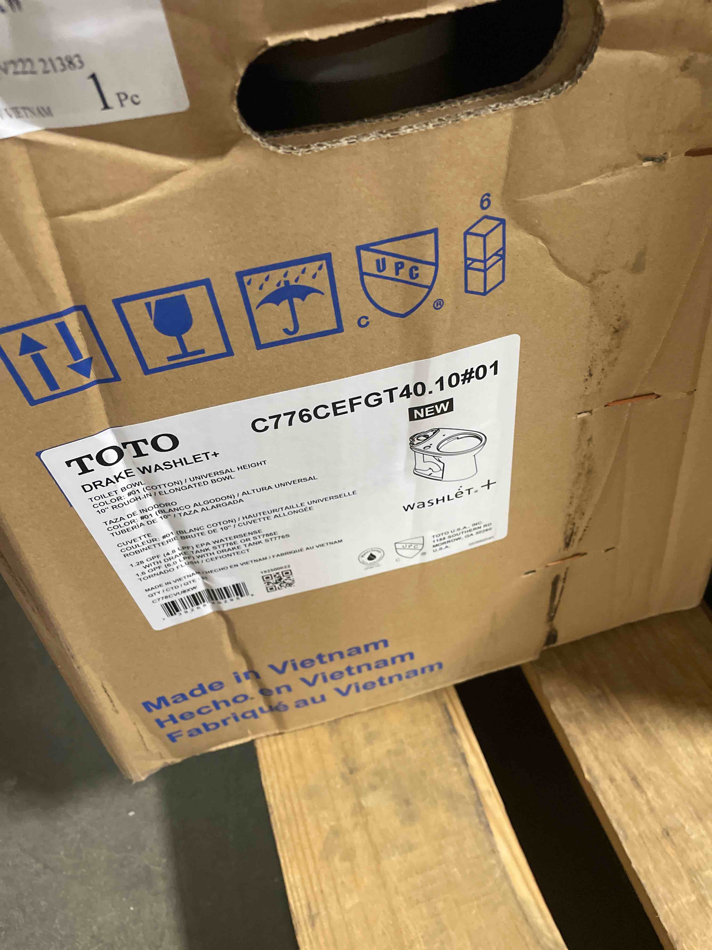 Condition photo showing New/Like New for toto drake elongated universal height tornado flush toilet bowl with 10 inch rough-in and cefiontect, washlet+ ready, cotton white - c776cefgt40.10#01