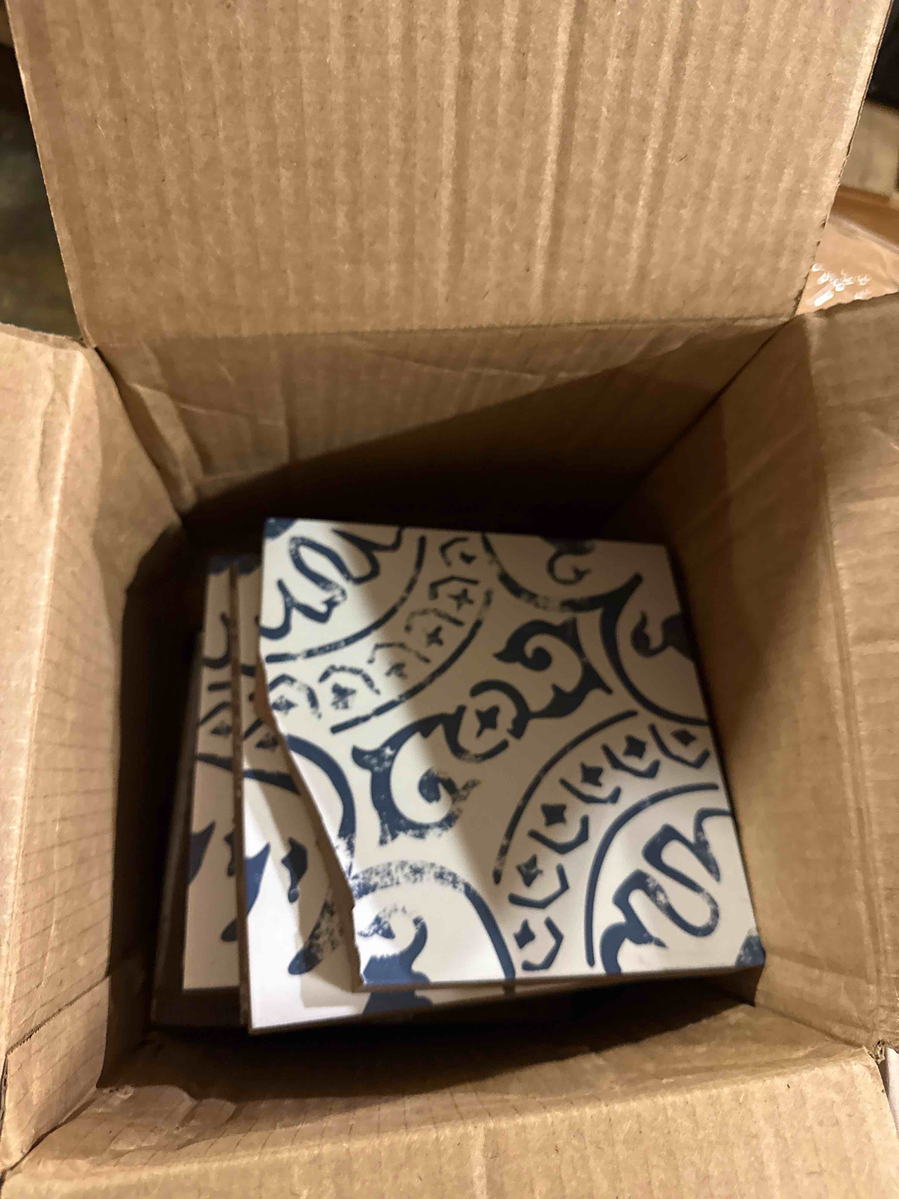 Condition photo showing As Is for msi indigo encaustic 8 in. x 8 in. glazed porcelain wall tile for bathroom, floor tile and kitchen backsplash indigo case