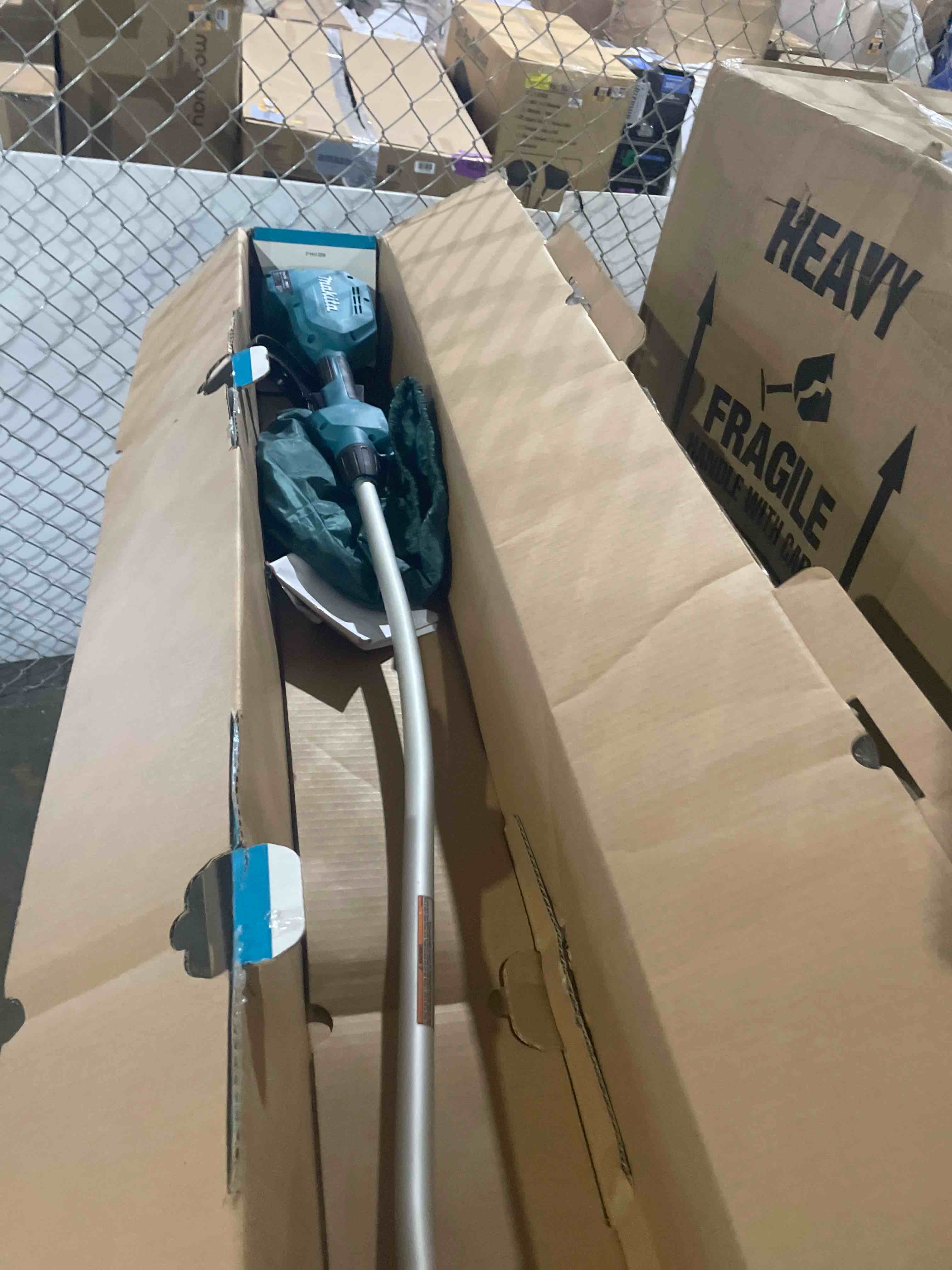 Condition photo showing As Is for makita xru23z 18v lxt® lithium-ion brushless cordless 13" string trimmer, tool only