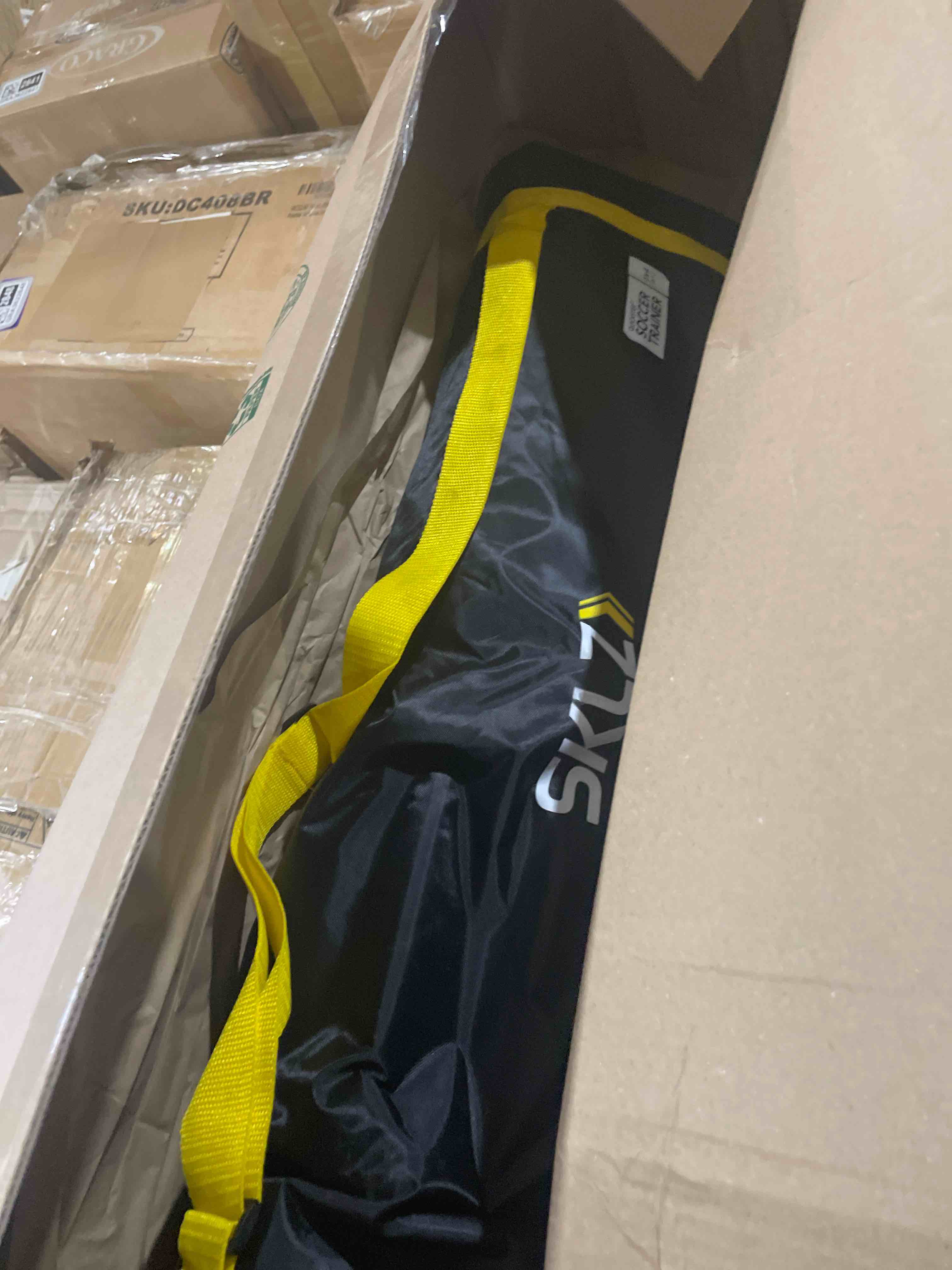 Condition photo showing New/Like New for sklz quickster soccer trainer - dual-sided rebounder for solo passing, receiving, trapping practice - large & small rebound net - weather resistant - adjustable frame, metal stakes & carry bag