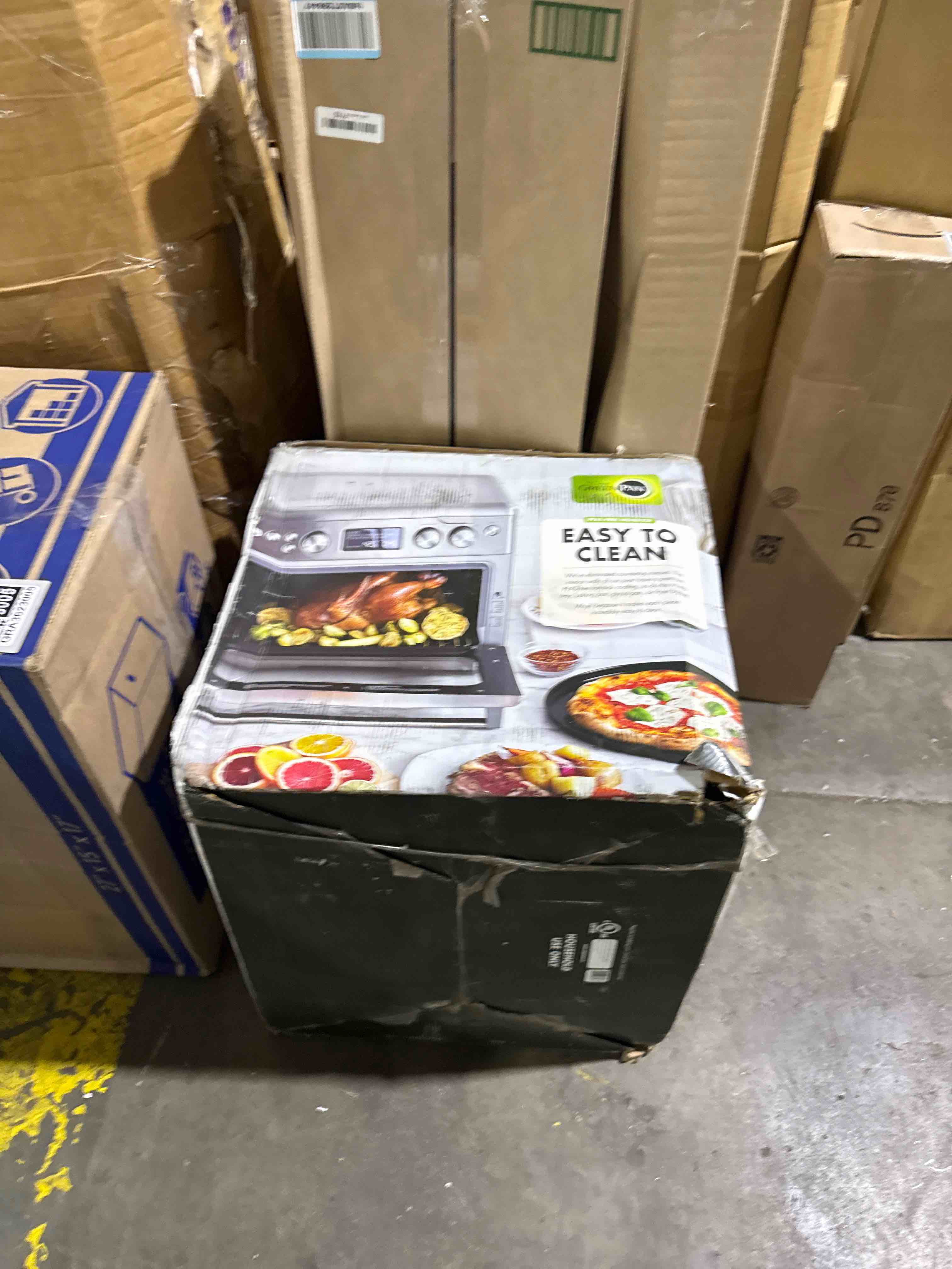 Condition photo showing Good Condition for greenpan 13-in-1 elite countertop convection oven and air fryer, pfoa and pfas-free ceramic tray and pizza pan, adjustable racks, multifunction presets, toaster, bake broil roast, stainless steel elite air fry oven silver