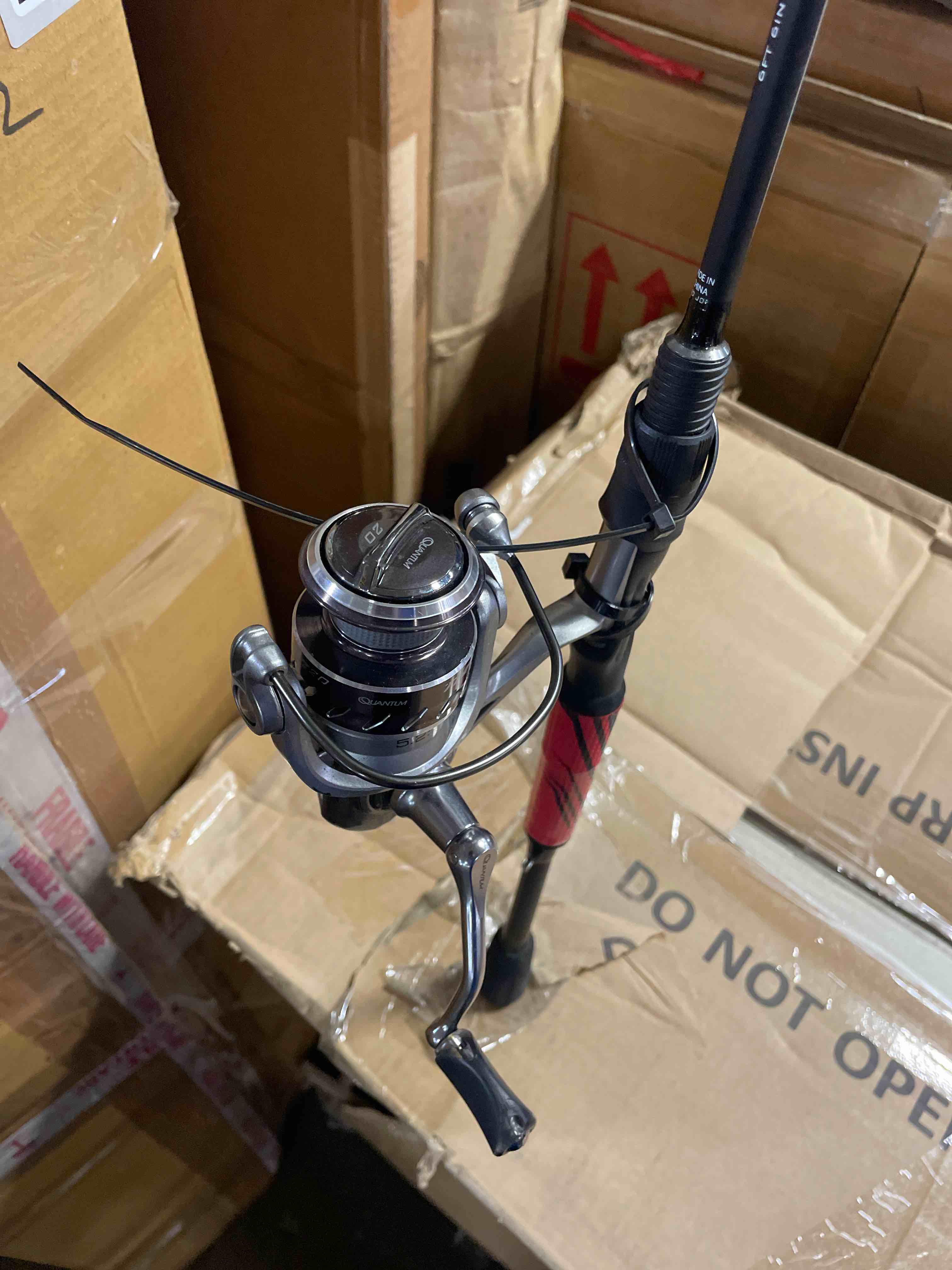 Condition photo showing As Is for quantum throttle spinning reel and fishing rod combo 6-foot 6-inch fishing rod size 20 reel silver (tip broken)
