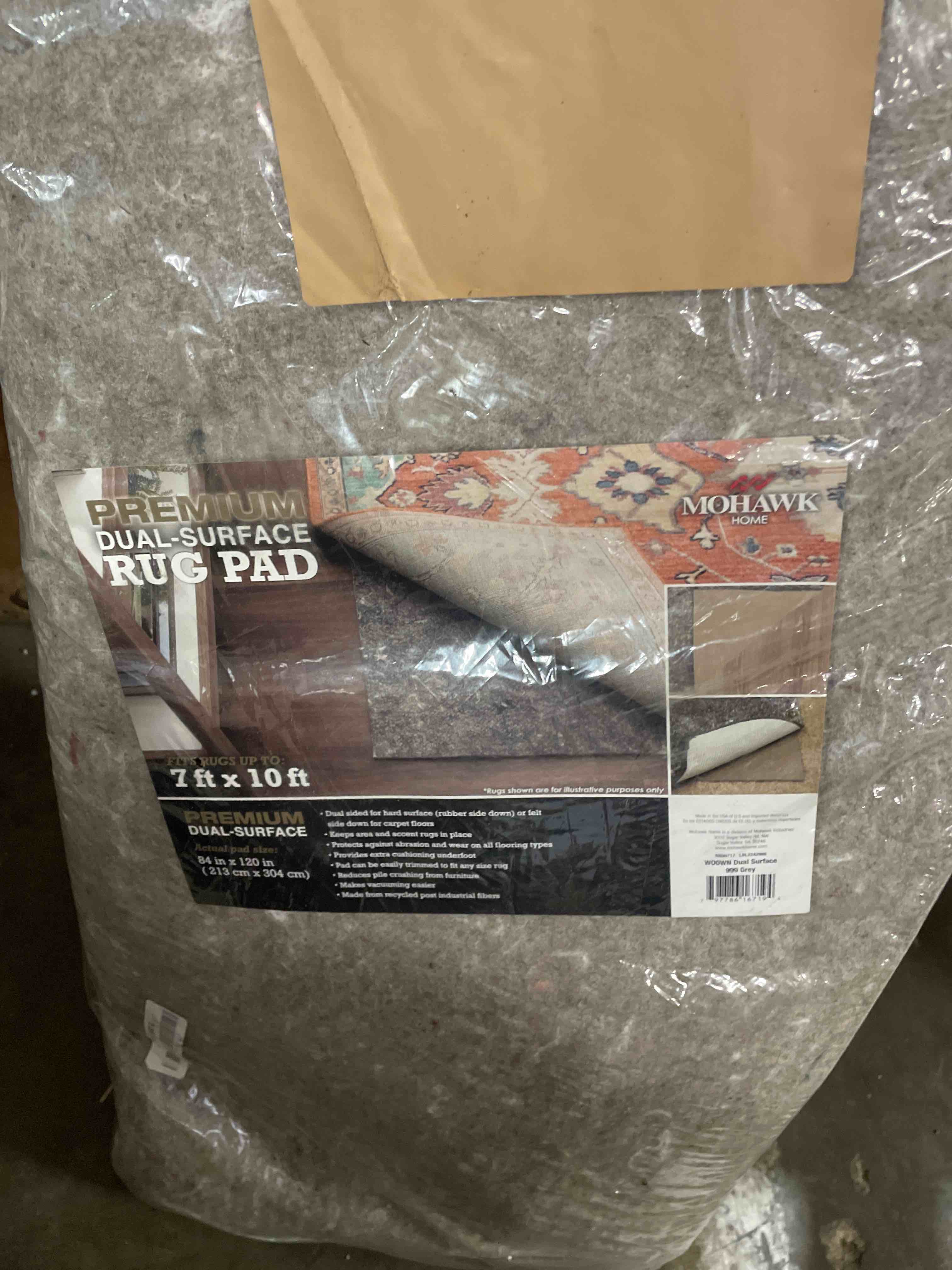 Condition photo showing New/Like New for mohawk home non slip rug pad 7' x 10'- 1/4" thick felt + latex rubber gripper - dual surface cushion for hardwood, carpet, tile floors, made in usa