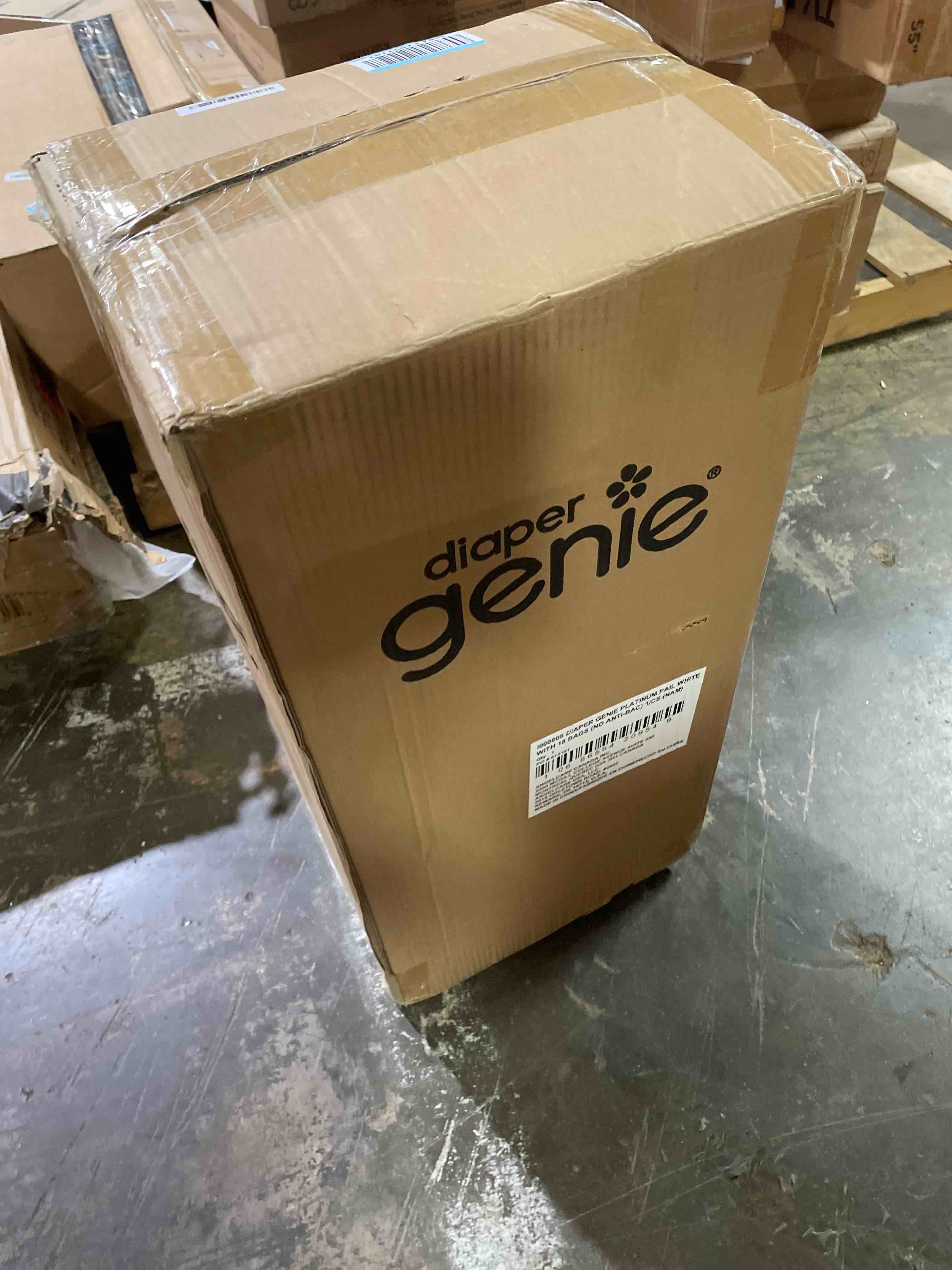Condition photo showing New/Like New for diaper genie platinum pail | hands-free odour-locking diaper pail (white) includes easy roll tear-off bags holding up to 846 newborn diapers.