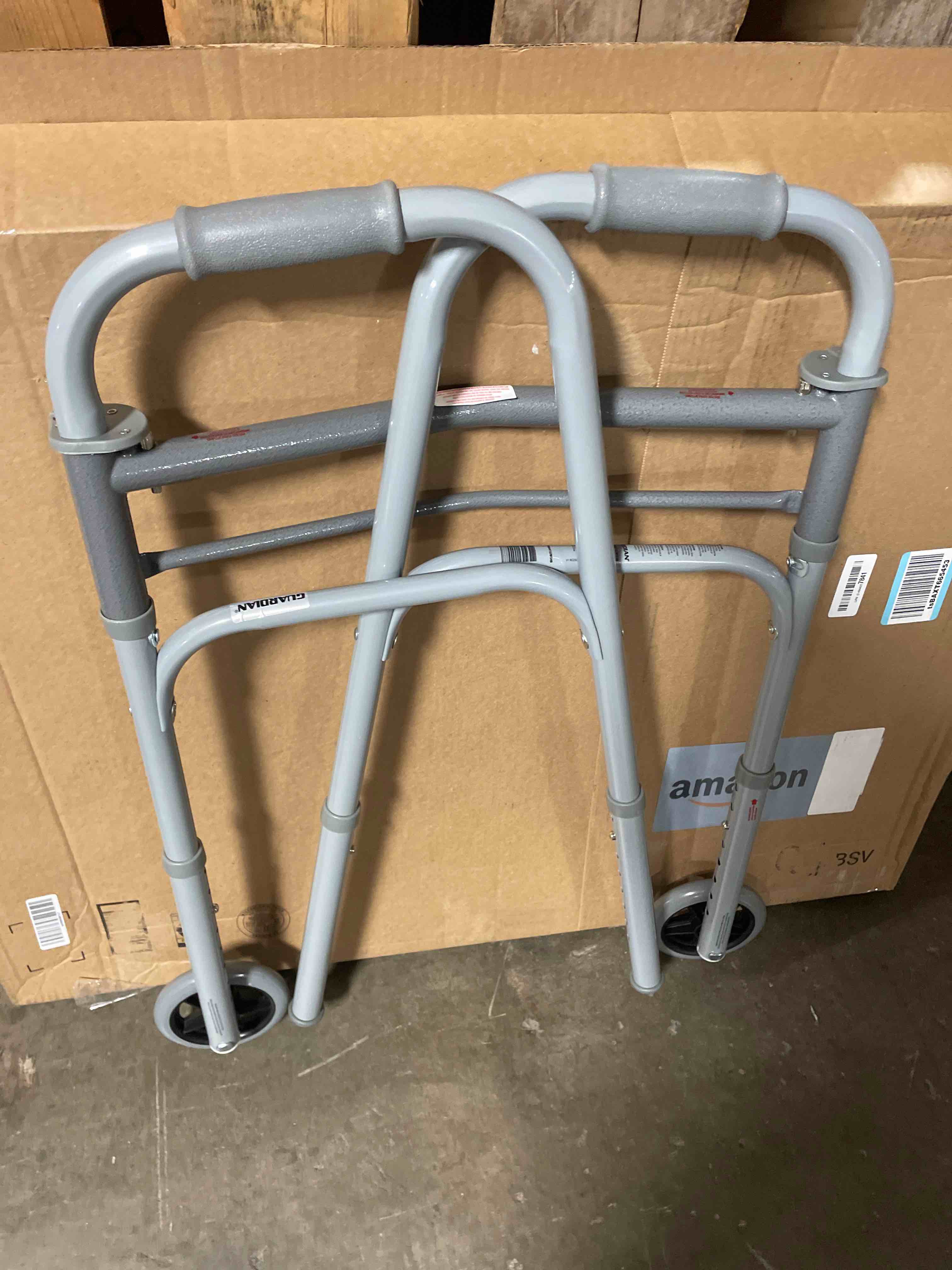 Condition photo showing New/Like New for drive medical two-button folding walker with wheels, height adjustable | two-button rolling walker features dual push-button operation, adjustable height and durable aluminum frame