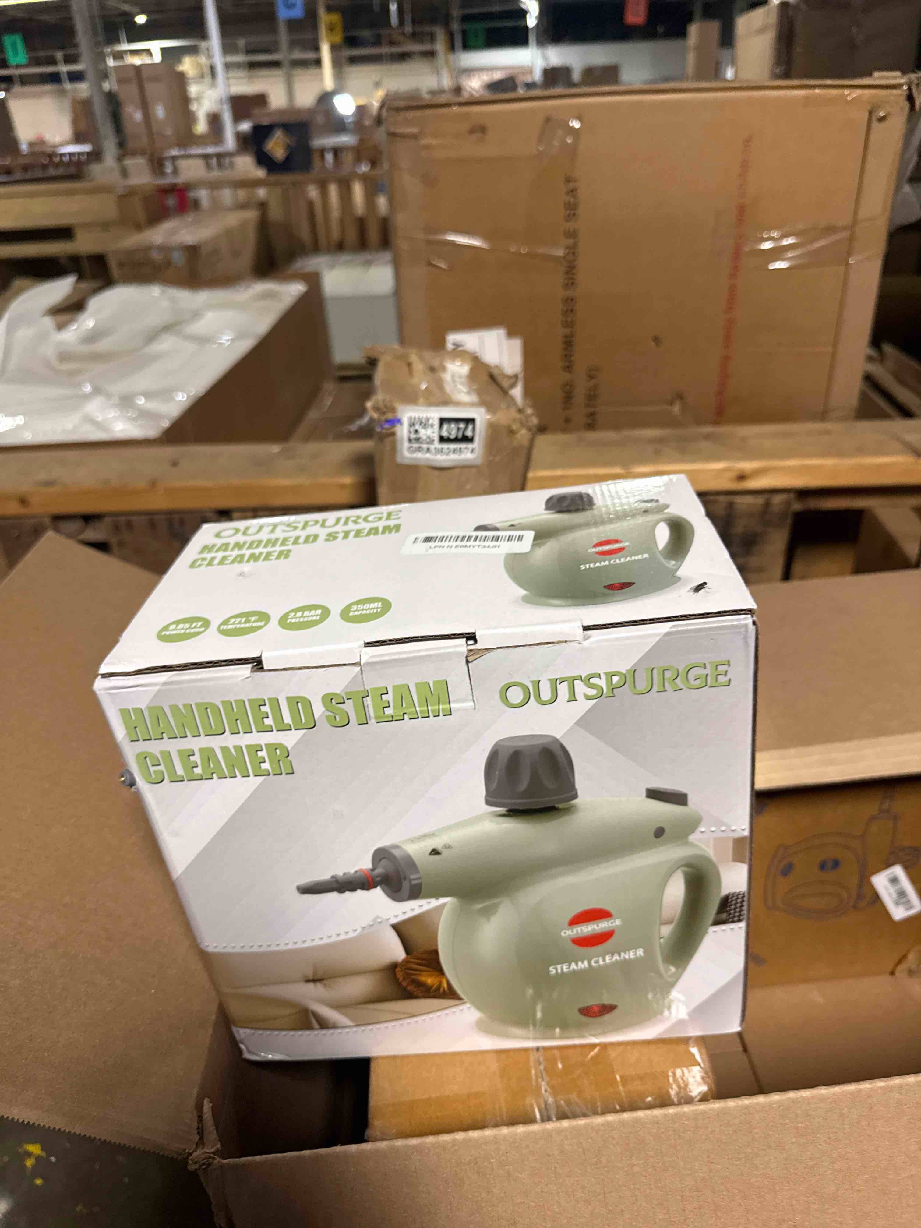 Condition photo showing New/Like New for handheld steam cleaner, pressurized multi-surface steam shot with 13 accessories, safety lock, steamer for cleaning floor, upholstery, grout, windows, couch and car, green