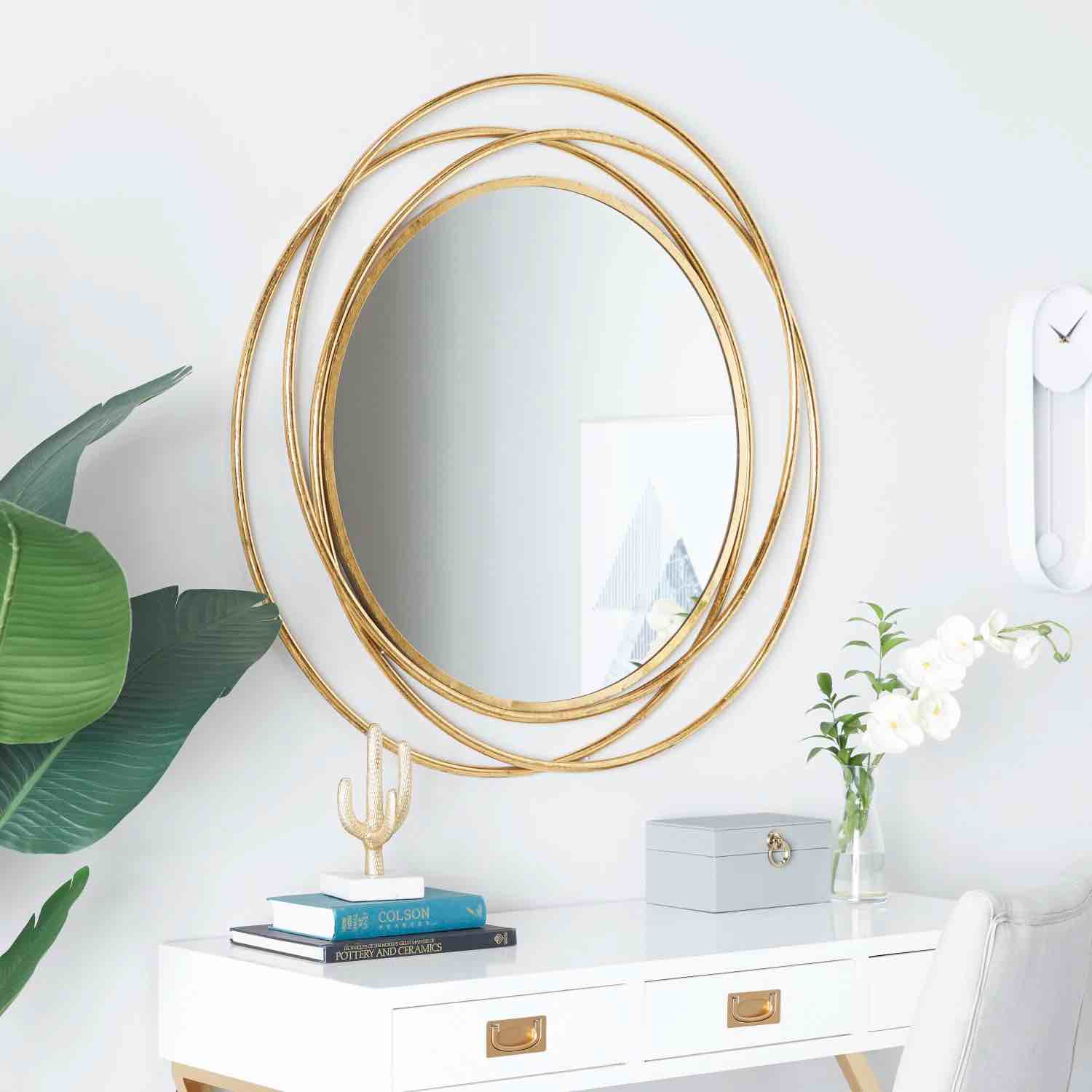 metal round wall mirror with overlapping circles