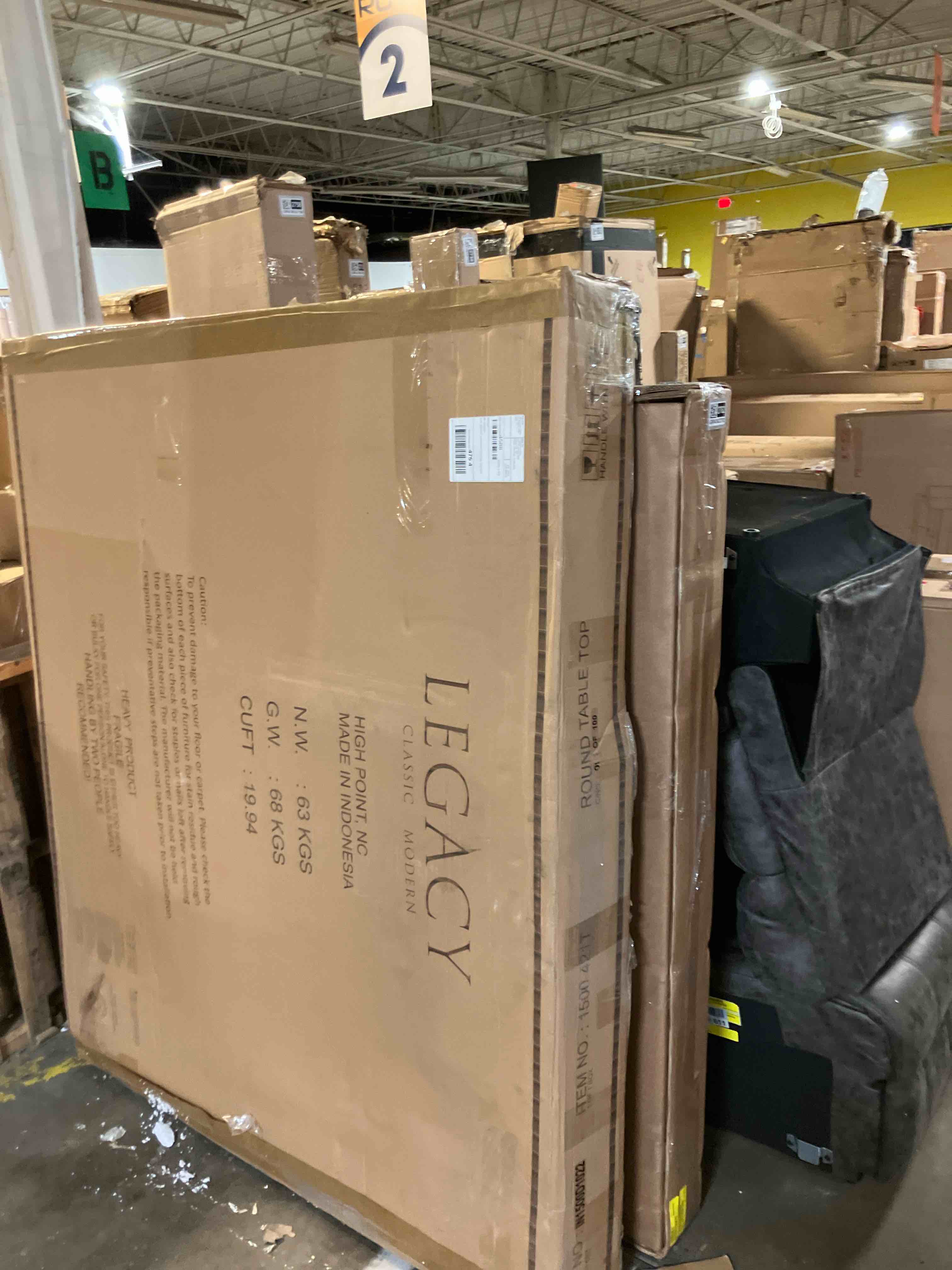 Condition photo showing As Is for Amery 48-66" Round to Oval Pedestal Dining Table  (Table top only) 