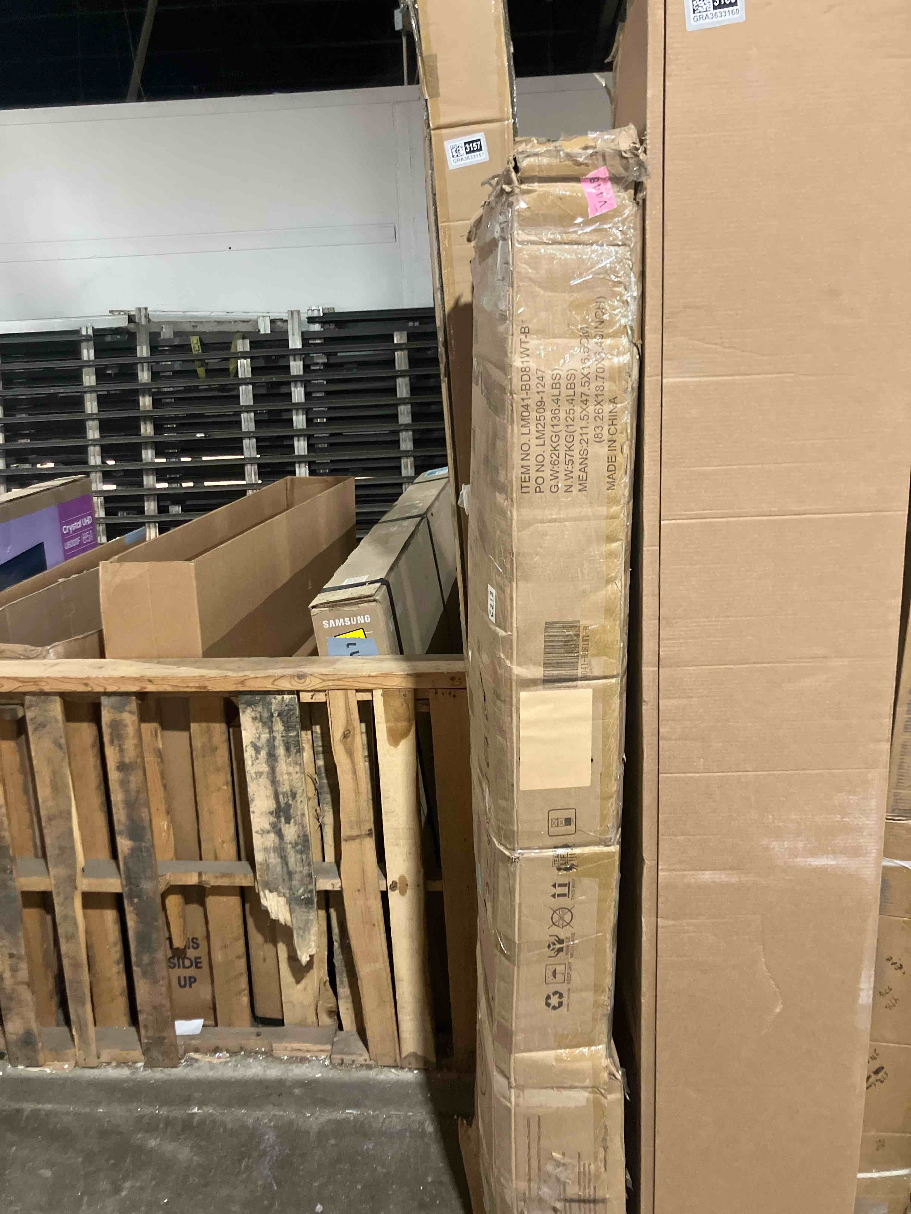 Condition photo showing New/Like New for Merluxy King Size Farmhouse Bed Frame with Barn Door Headboard, Platform Bed Frame with Wood Slats, Under Bed Storage Space, Distressed White ( 2 boxes)