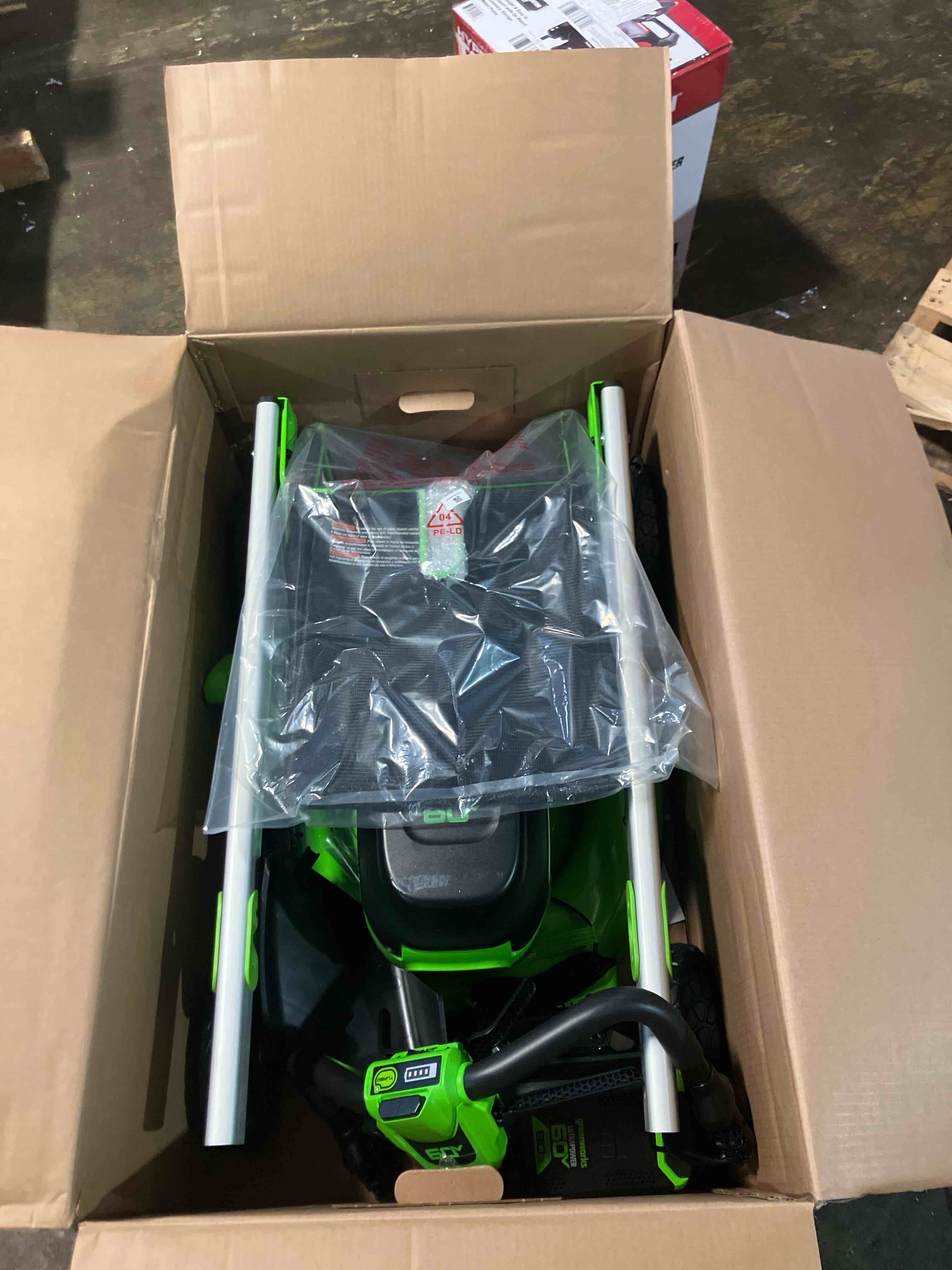Condition photo showing New/Like New for Greenworks 60V 21 Self Propelled Lawn Mower with (1) 8.0 Ah Battery & Rapid Charger 2546402