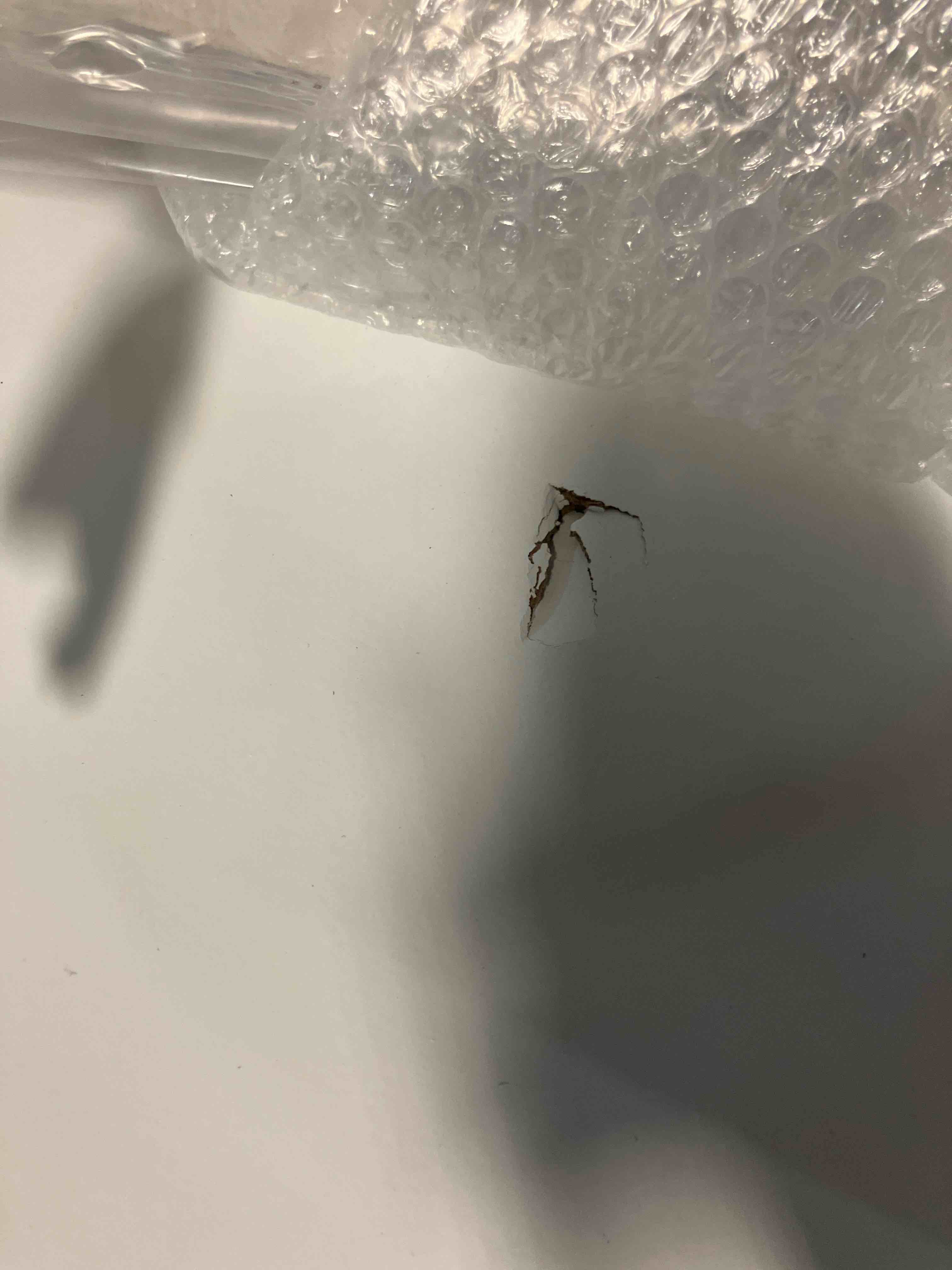 Condition photo showing As Is for 1-panel door, white primed shaker 80 in. x 18 in. (hole in door)