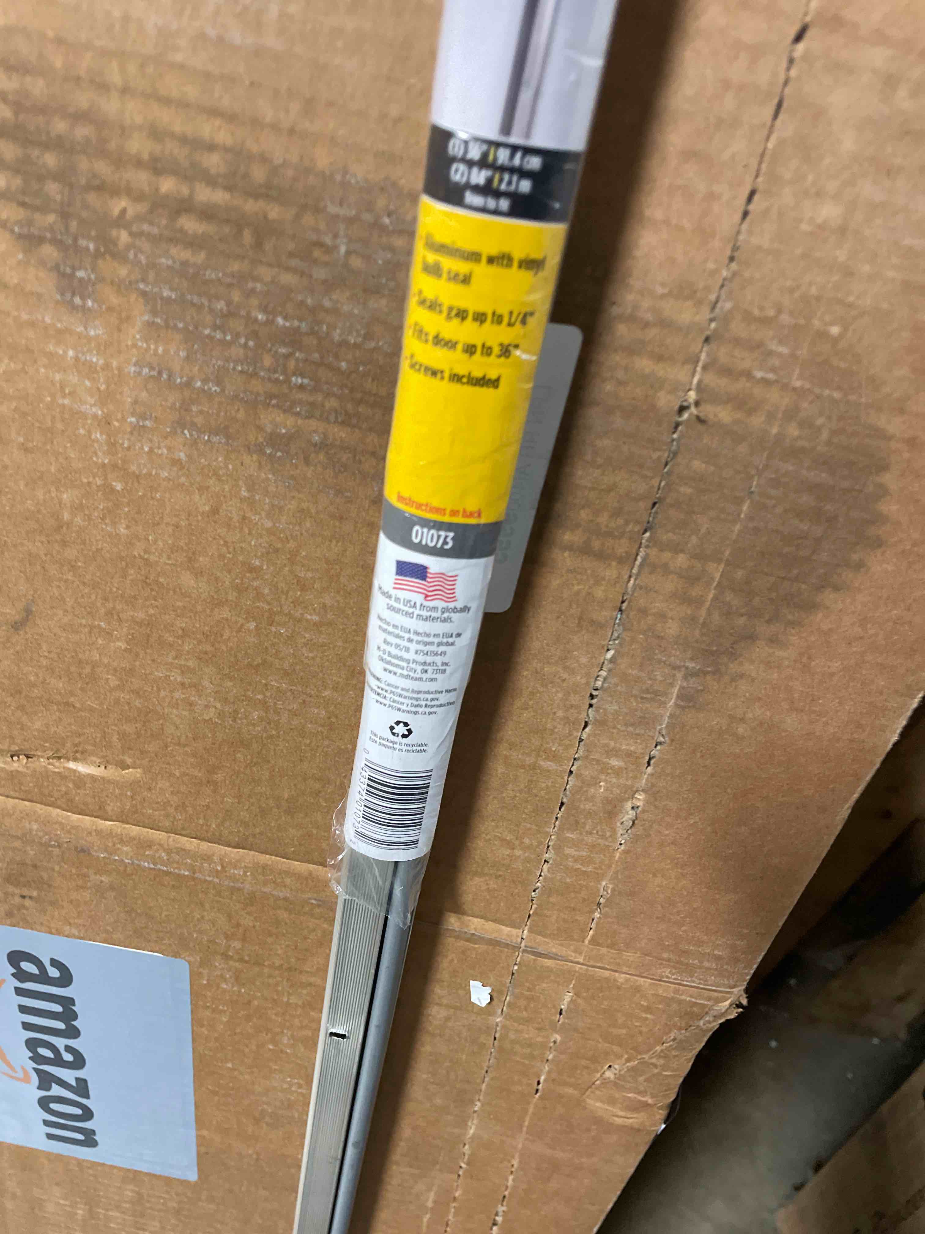 Condition photo showing Good Condition for m-d building products 01073 silver aluminum and vinyl screw-on top and sides door seal kit